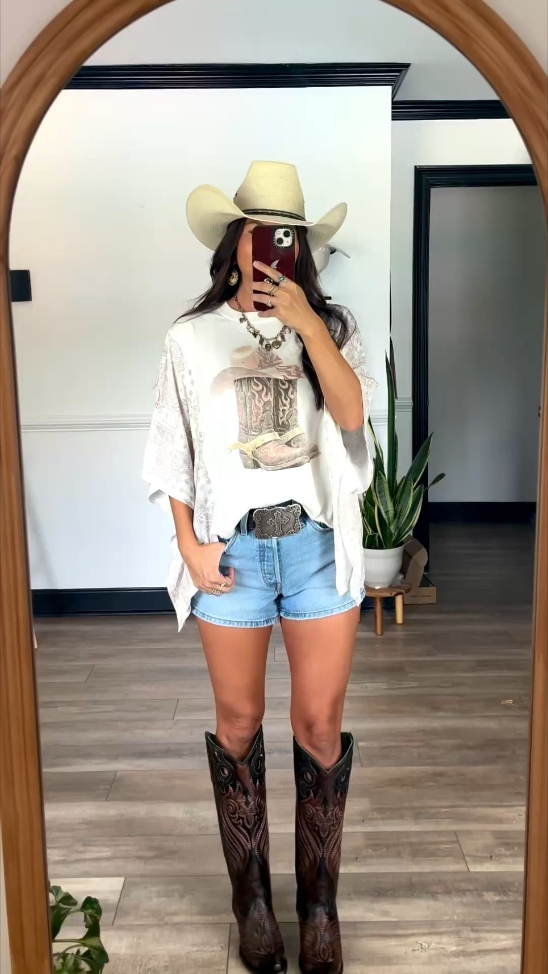 Casual summer look with western boots! Love the flowy sleeves in the top! Wearing xs top and 26 shorts

#LTKootd #LTKgrwm #LTKSeasonal
