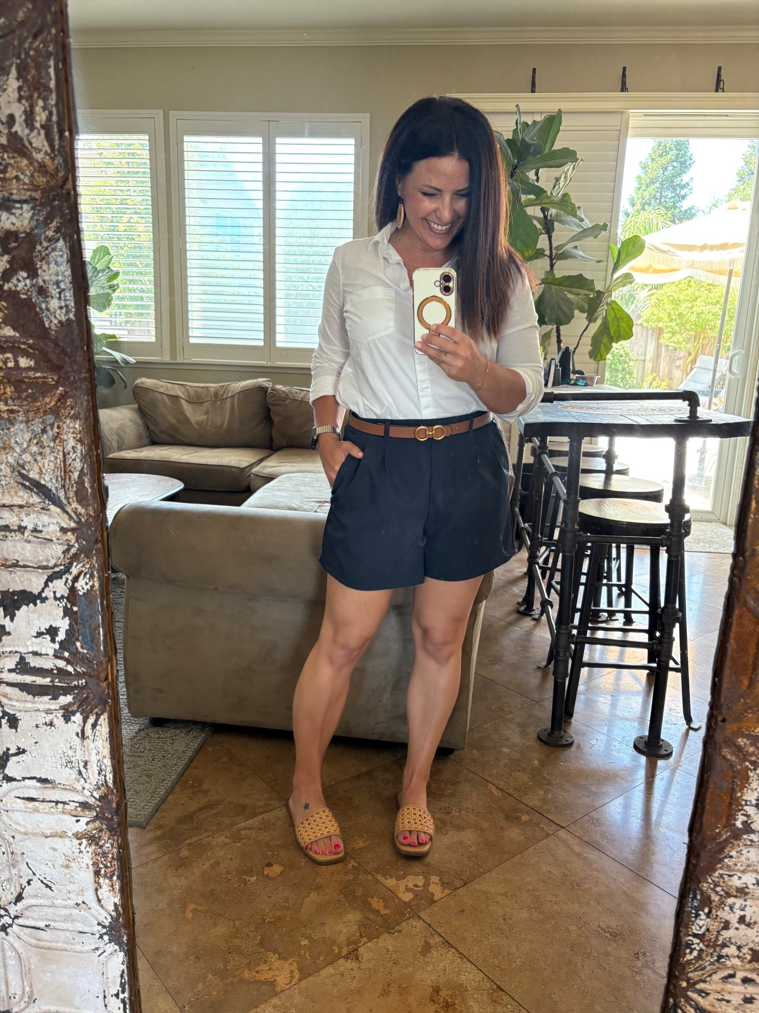 Classic preppy summer look. Belted shorts, white button down shirt, sandals. 

#LTKOver40 #LTKTravel #LTKSummerEdit