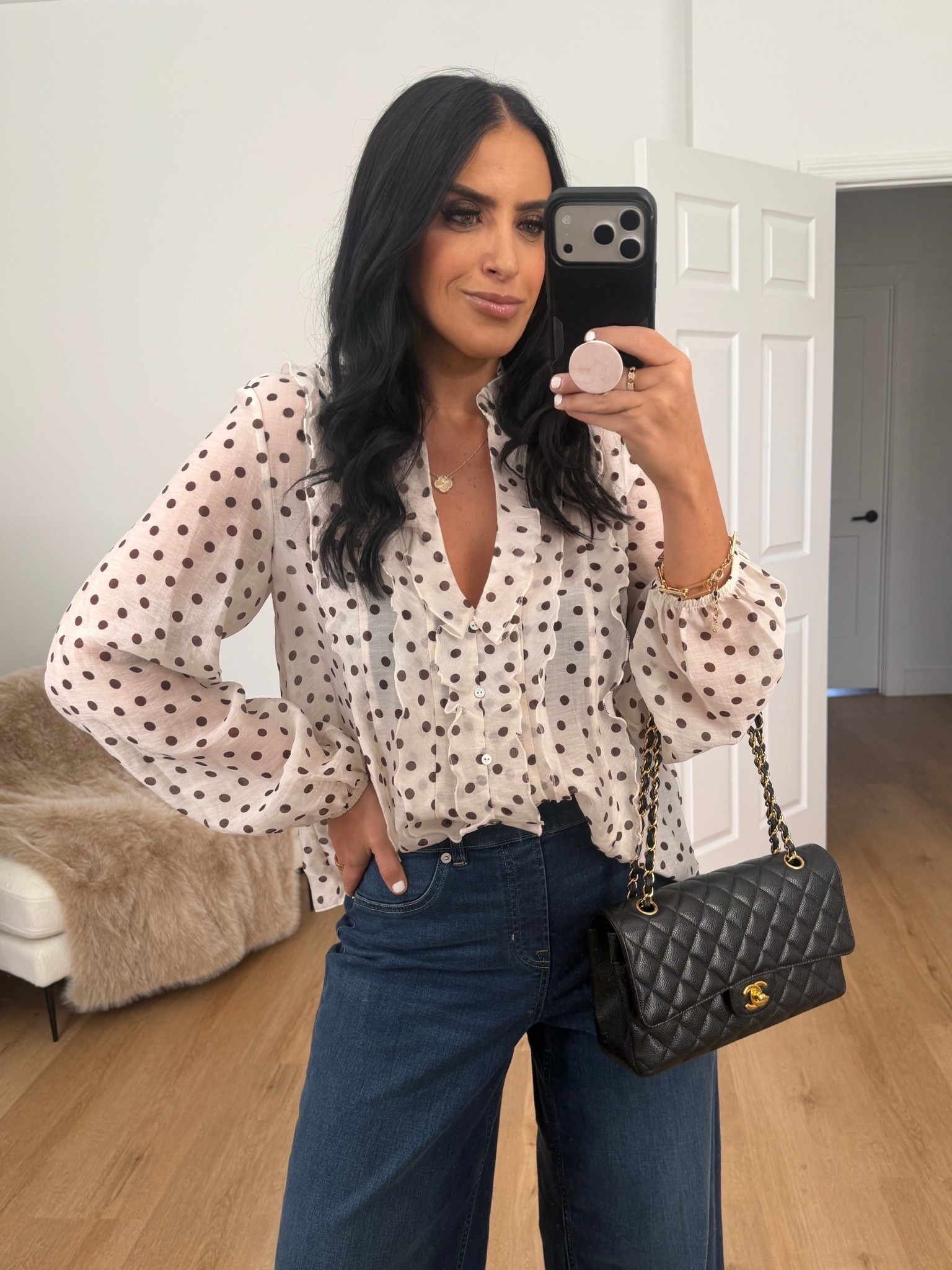 Zara ruffled polka dot blouse wearing size small. Spanxshape Everywear Wide Leg Jeans wearing size medium. 