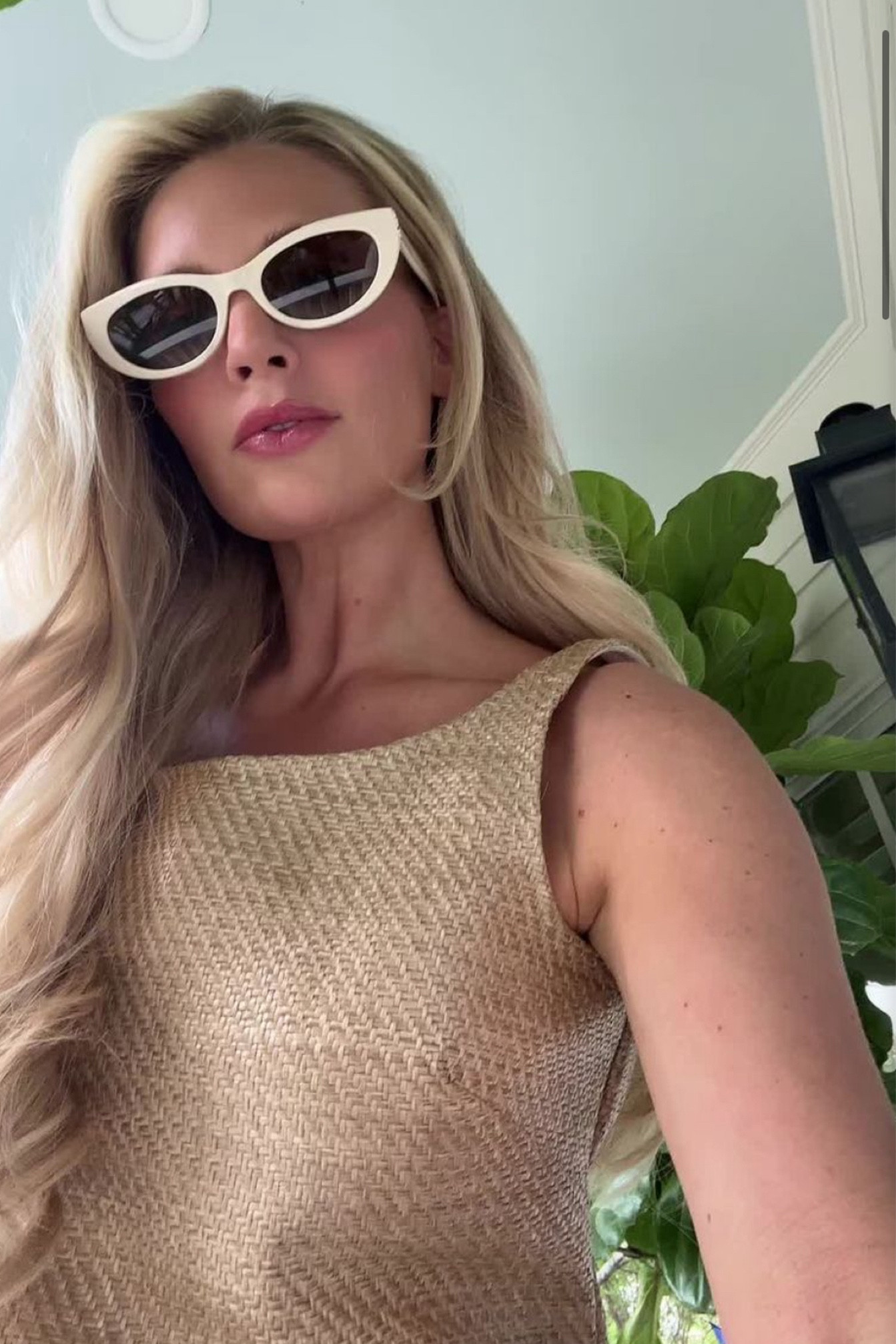 Madison LeCroy in a tan raffia dress.  The perfect summer outfit for day or nightt

#LTKSeasonal #LTKSaleAlert #LTKSummerSales