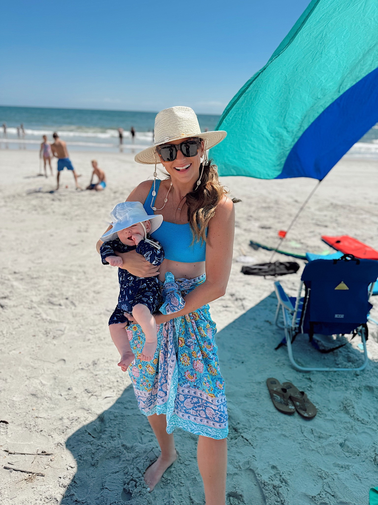 Mommy & me beach day! I’m in a large 2 piece swimsuit, one size sarong, shell hat and accessories- fits tts.

#LTKSwim #LTKBaby #LTKStyleTip