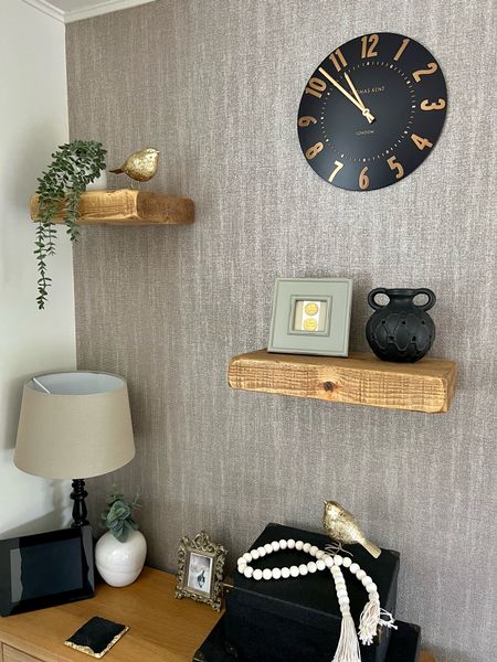 Hi everyone! I’ve recently redecorated my living room so I thought I’d share a few pieces. The chunky oak shelving gives a modern but rustic look. It’s available in different sizes, I went with two different lengths. The black & gold wall clock is on trend. I made the wood bead garland, however I’ve linked a similar one if you’re not so crafty 😊. 

U.K. blogger, home interiors, decor, Amazon  

#LTKhome #LTKeurope #LTKstyletip