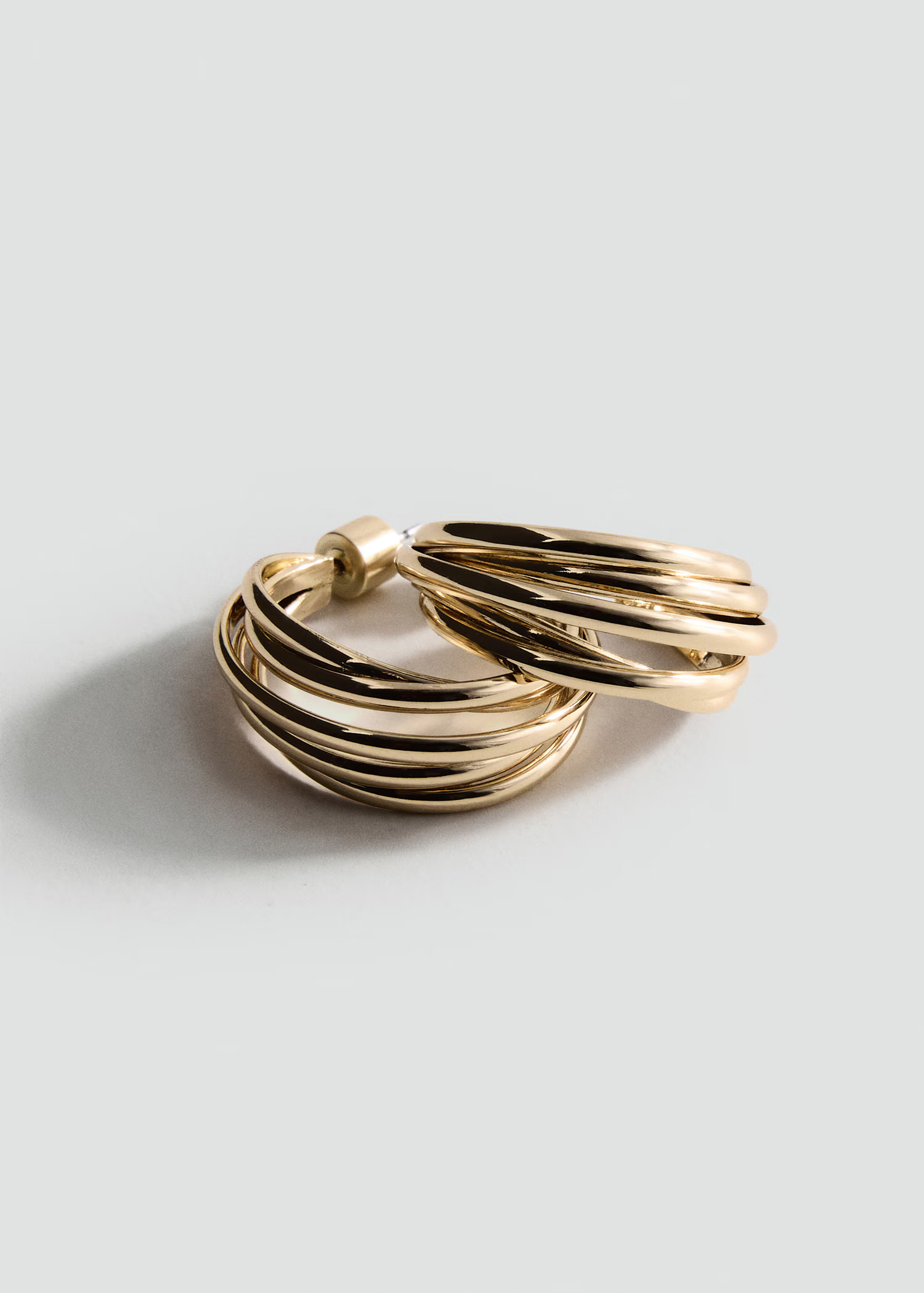 Intertwined hoop earrings - Women | MANGO United Kingdom | MANGO (UK)