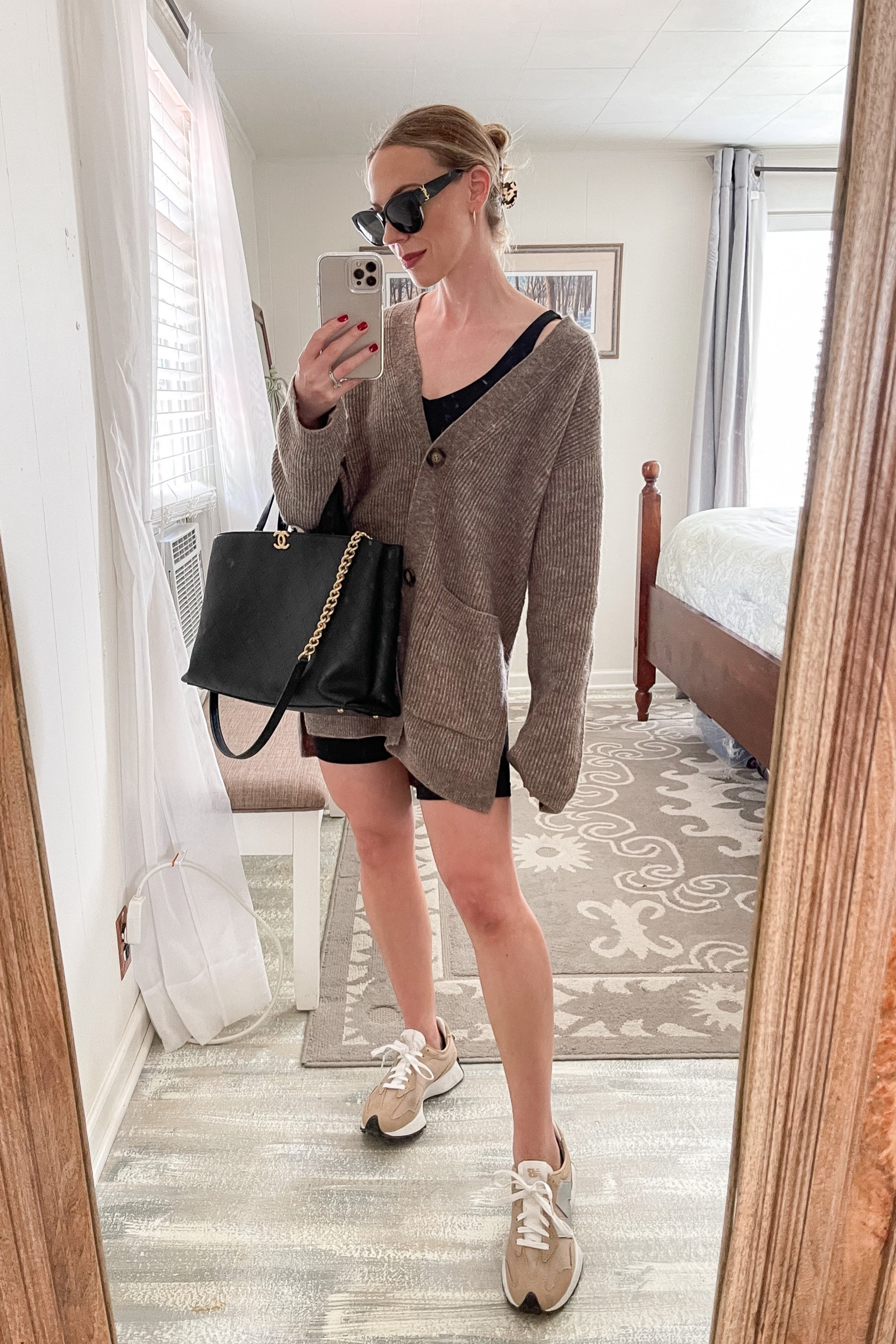 Cardigan sweater with bike shorts casual fall outfit, New Balance 327 sneakers 

#LTKshoecrush #LTKSeasonal #LTKunder50