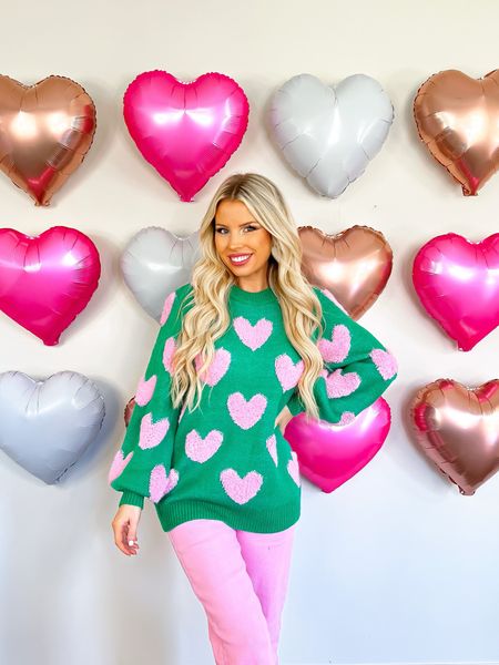 Valentine’s Day decor. Valentine’s Day balloon wall. Valentine’s Day outfit. Valentine’s Day sweater. Heart sweater  

#LTKhome #LTKSeasonal #LTKFind