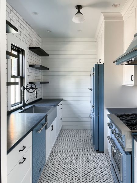 Galley Kitchen | Waterstone Faucet | Soapstone Tops | Printed Tile Floor | Floating Shelves | Shiplap | Retro Light Fixture | Colored Appliances @bigchill

#LTKstyletip #LTKhome