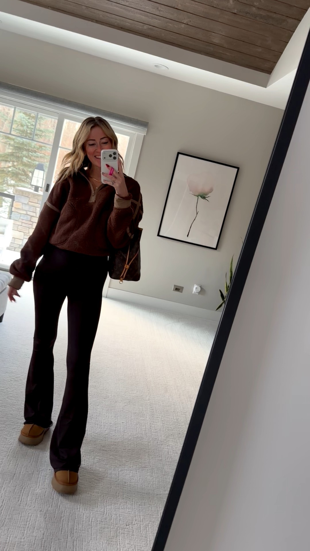 Cold weather outfit ideas for sports mom and soccer moms 
Brown leggings flare and Sherpa pullover 