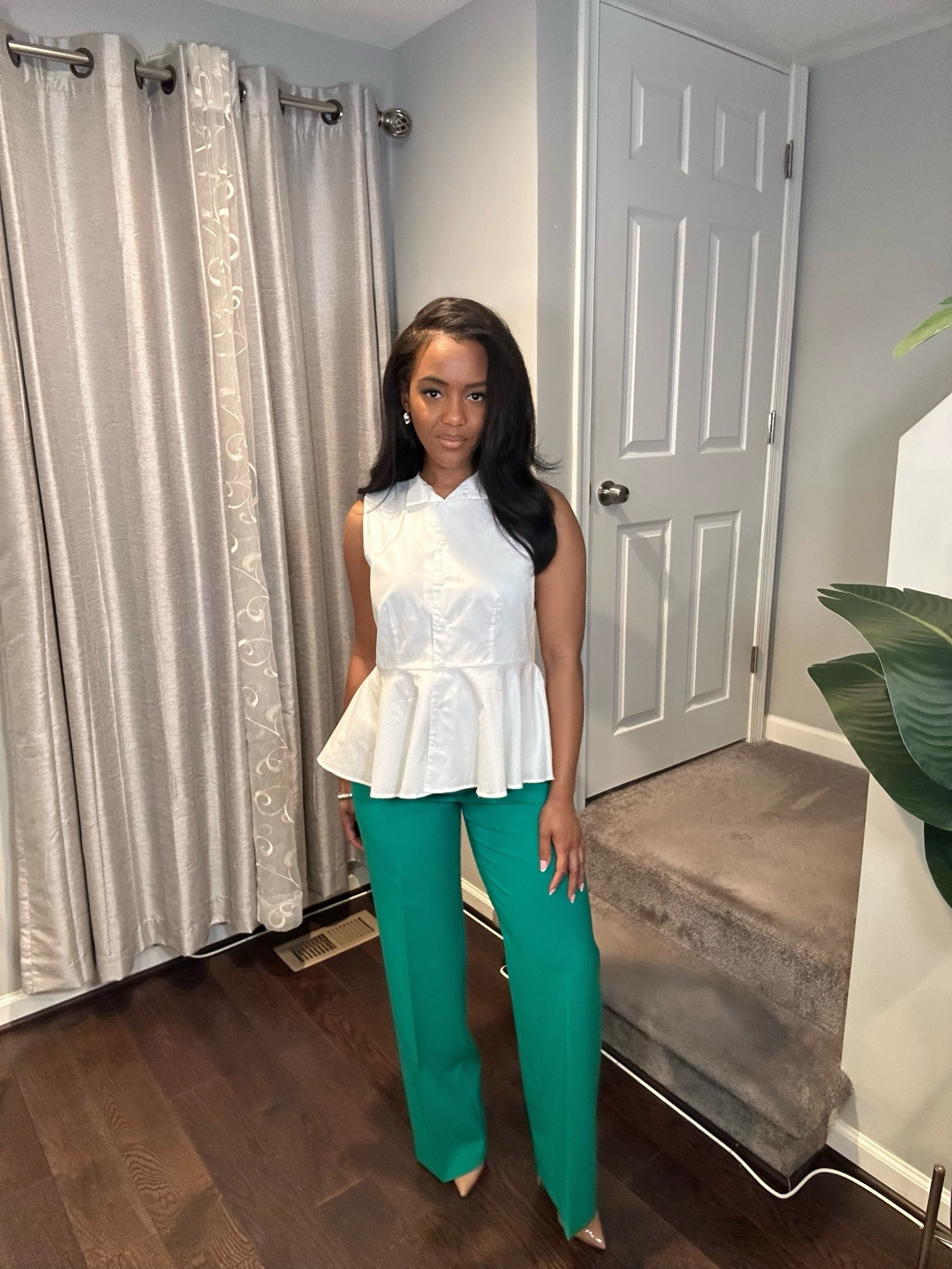 Peplum builds in waist definition, so no tucking or belting needed. Balance it with a wide-leg trouser. Tap for both pieces.