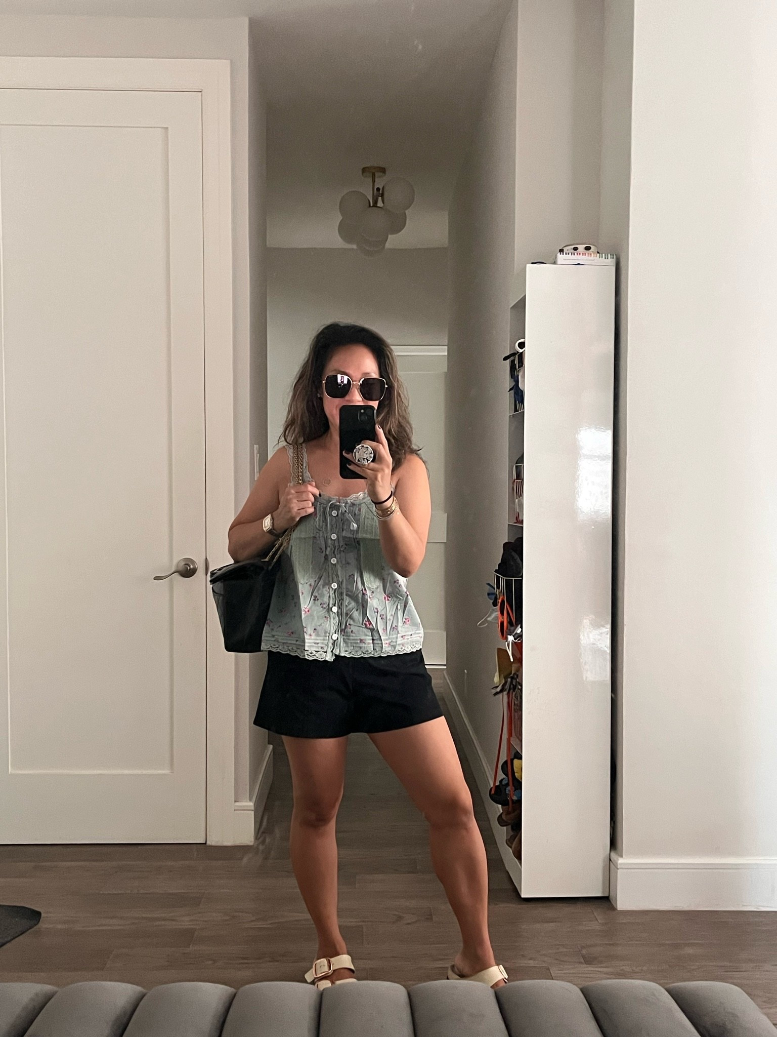 Easy top. Free People, but not. Shorts are a steal. They run tts on the bigger side. Great mid-length short for short girls.

#LTKootd #LTKmomlife #LTKTravel