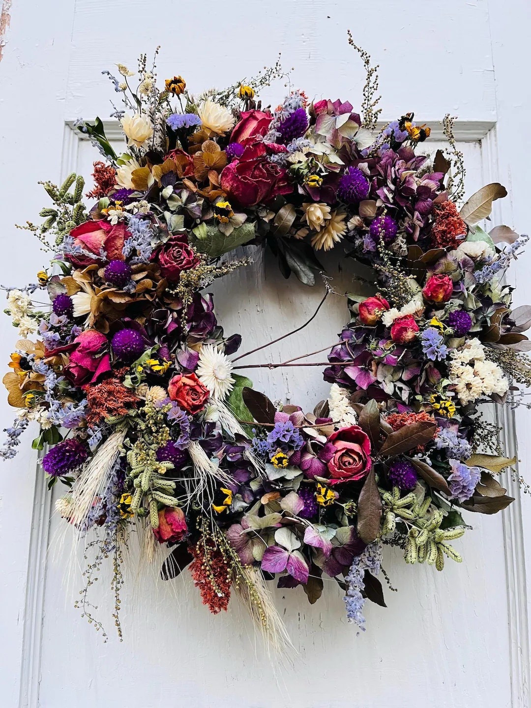 Cozy, warm, and full of fall charm 🍂 This all–dried flower wreath blends wheat, roses, strawflowers, and rich greenery in beautifully muted tones of rust, lavender, deep eggplant, and buttery cream. Perfectly sized to shine as a focal point above a mantel or layered into a gallery wall, it brings timeless seasonal beauty to your home—made even better with eco-friendly shipping from Pennsylvania.
#LTKHome #FallDecor #DriedFlowerWreath #SeasonalStyle #EtsyFinds #AutumnHome #SustainableDecor #WreathInspo

#LTKSeasonal #LTKdayinmylife #LTKHome