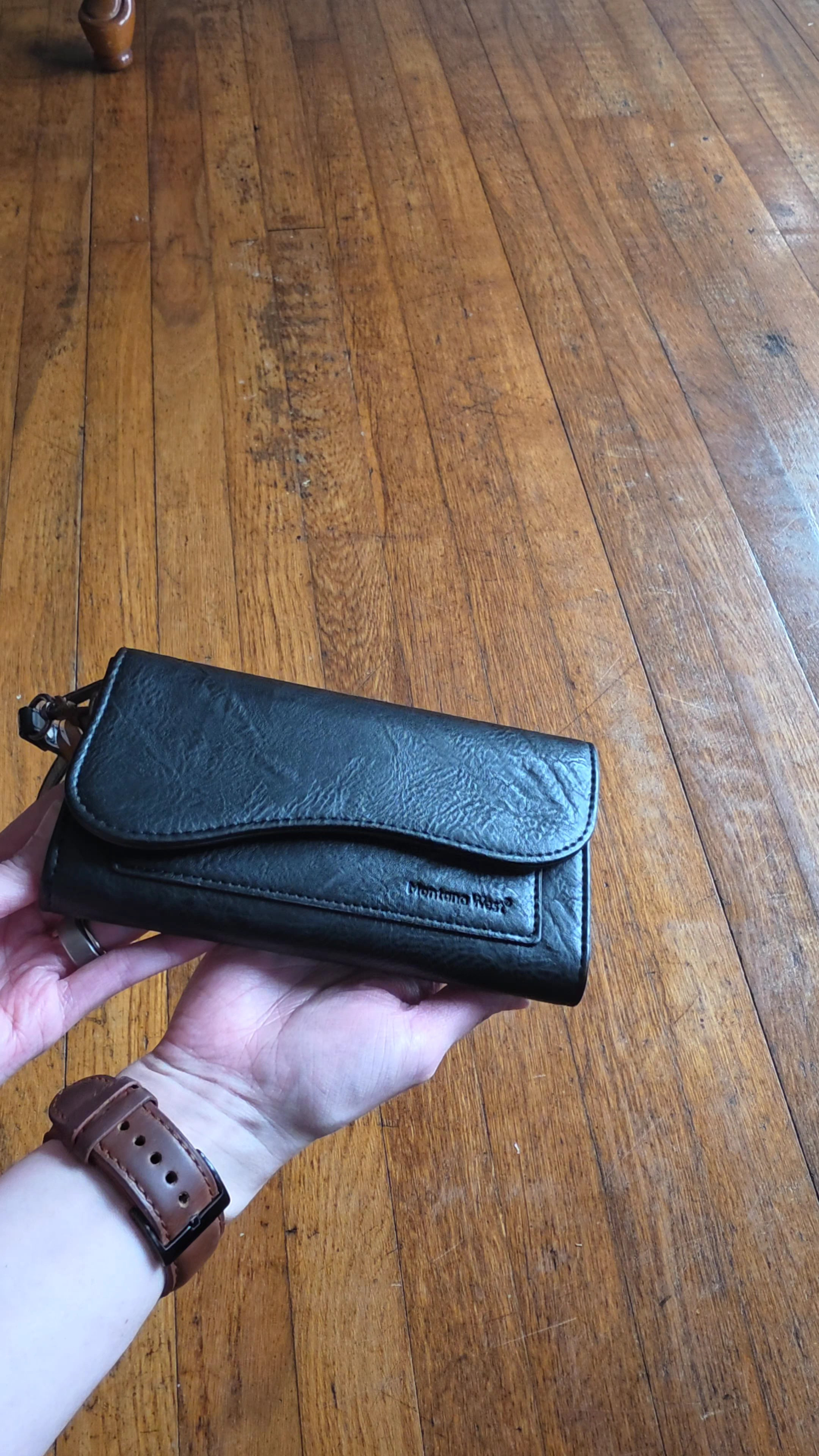 The sleek, black leather wallet that goes with everything.This is a little unboxing of my new Montana West wallet. I absolutely love it! There's plenty of room for my debit card, credit cards, cash, and change. I often grab this as I'm heading out the door, leaving my purse at home.#leatherwallet #amazonfinds

#LTKU