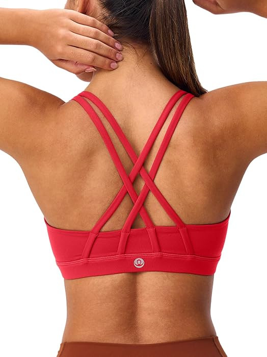 Strappy Sports Bra Criss Cross Back Padded     Light compression yoga crop top,U neckline,stays p... | Amazon (US)