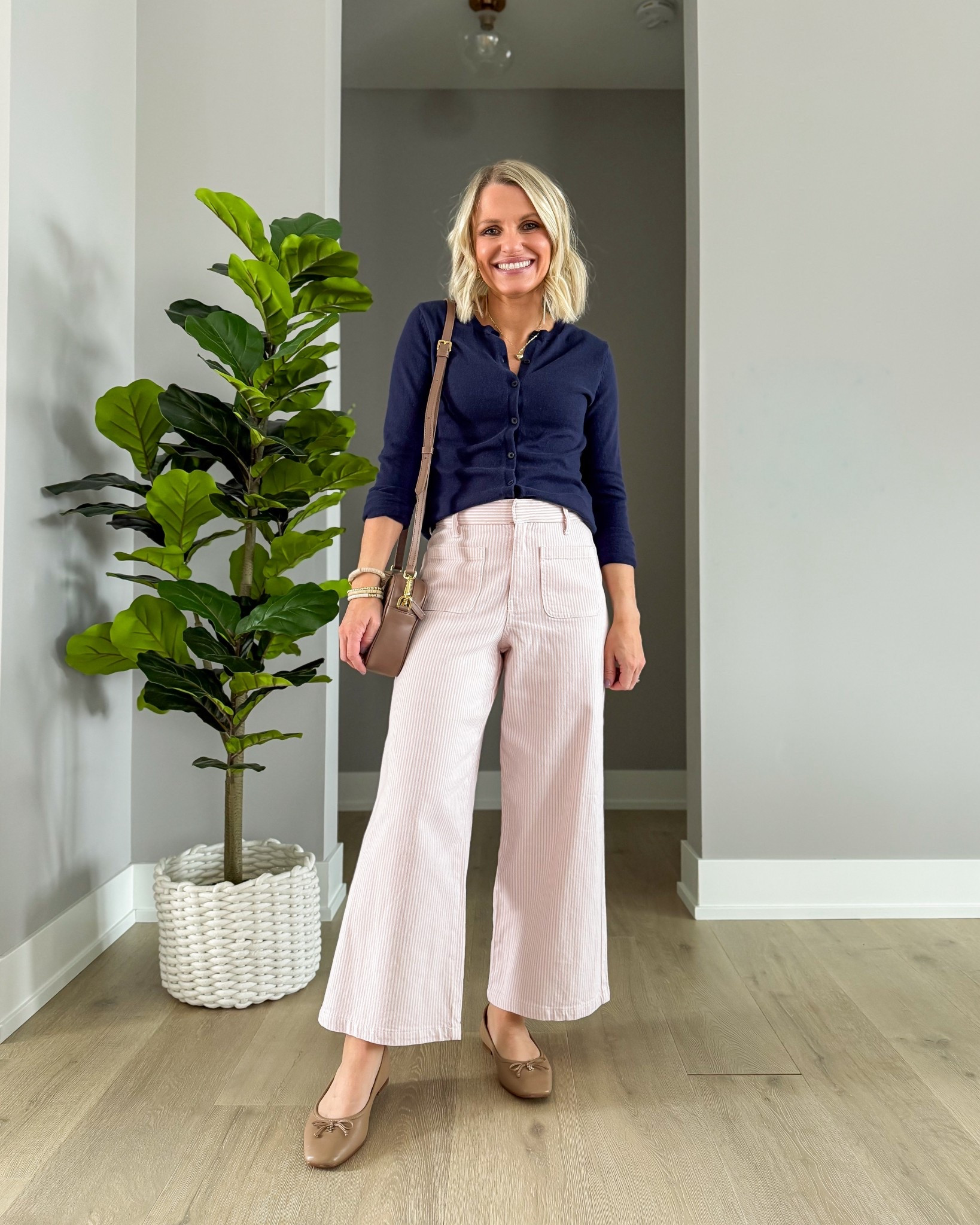 Spring outfit with wide leg pink pants. 

#LTKOver40 #LTKootd #LTKSeasonal