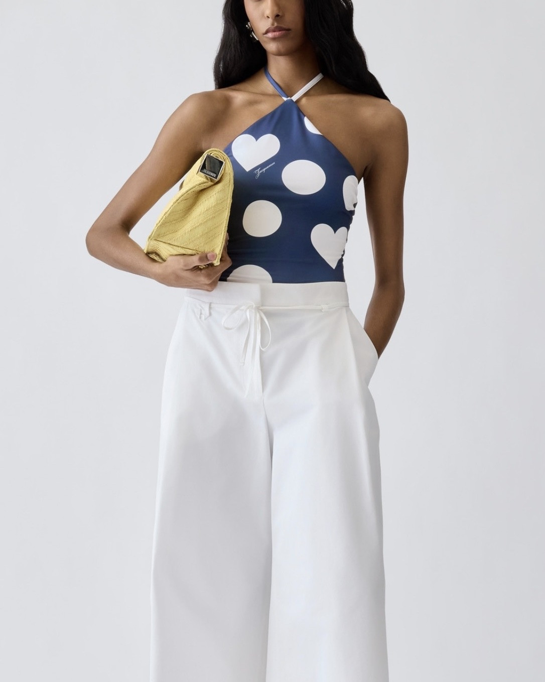Jacquemus The Bastide swimsuit

This sleek one‑piece swimsuit is cut in a smooth, sculpting fabric with a clean, minimalist finish that brings a quiet polish to pool days. Designed with a peaked halter neckline and adjustable ties, it offers a modern silhouette that feels both playful and effortless.

#LTKSeasonal #LTKTravel #LTKootd