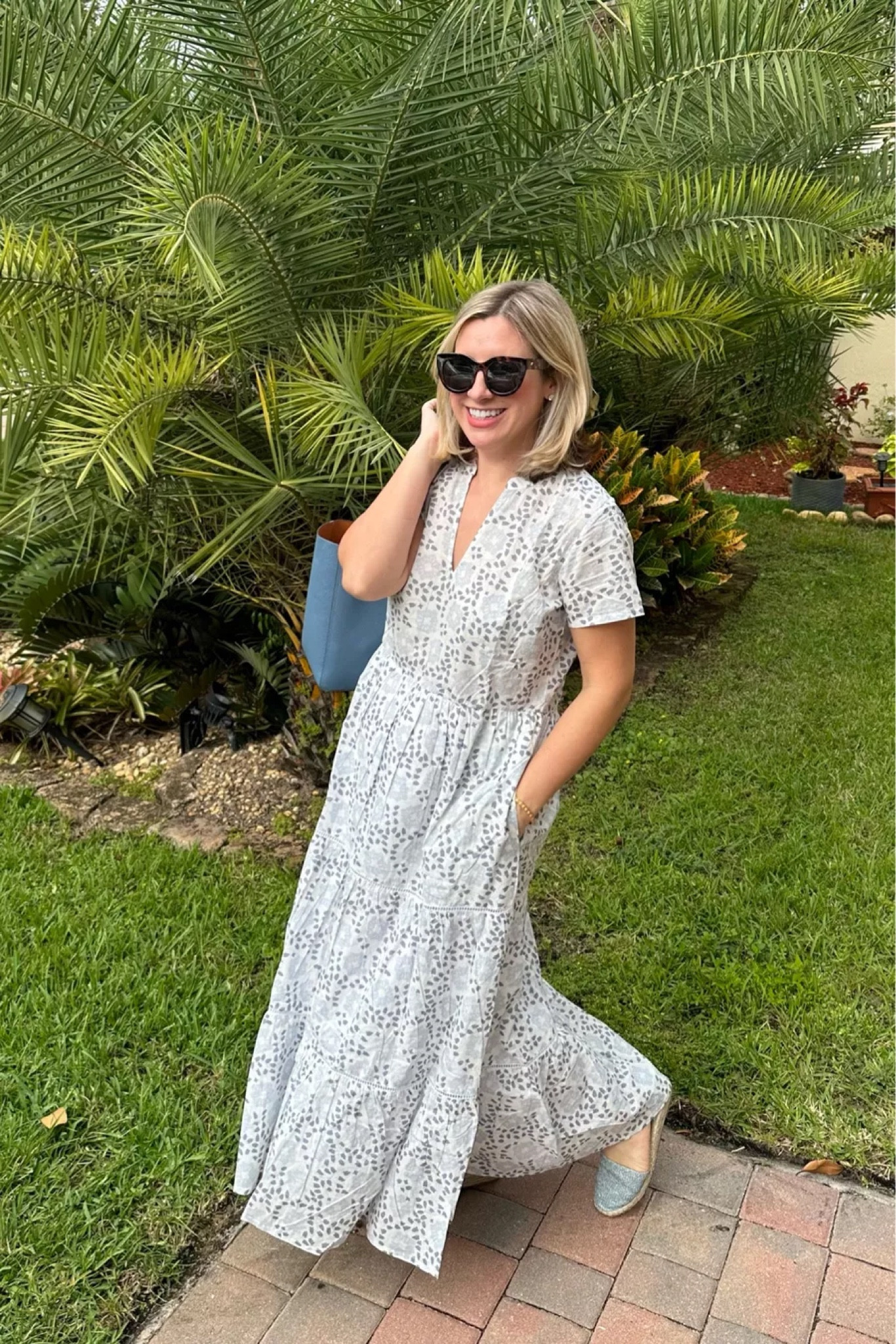 Spring dress, lightweight. Runs big. Wearing a medium here with some room at the waist. Shoes are so comfortable! TTS

#LTKfindsunder50 #LTKGiftGuide #LTKmidsize