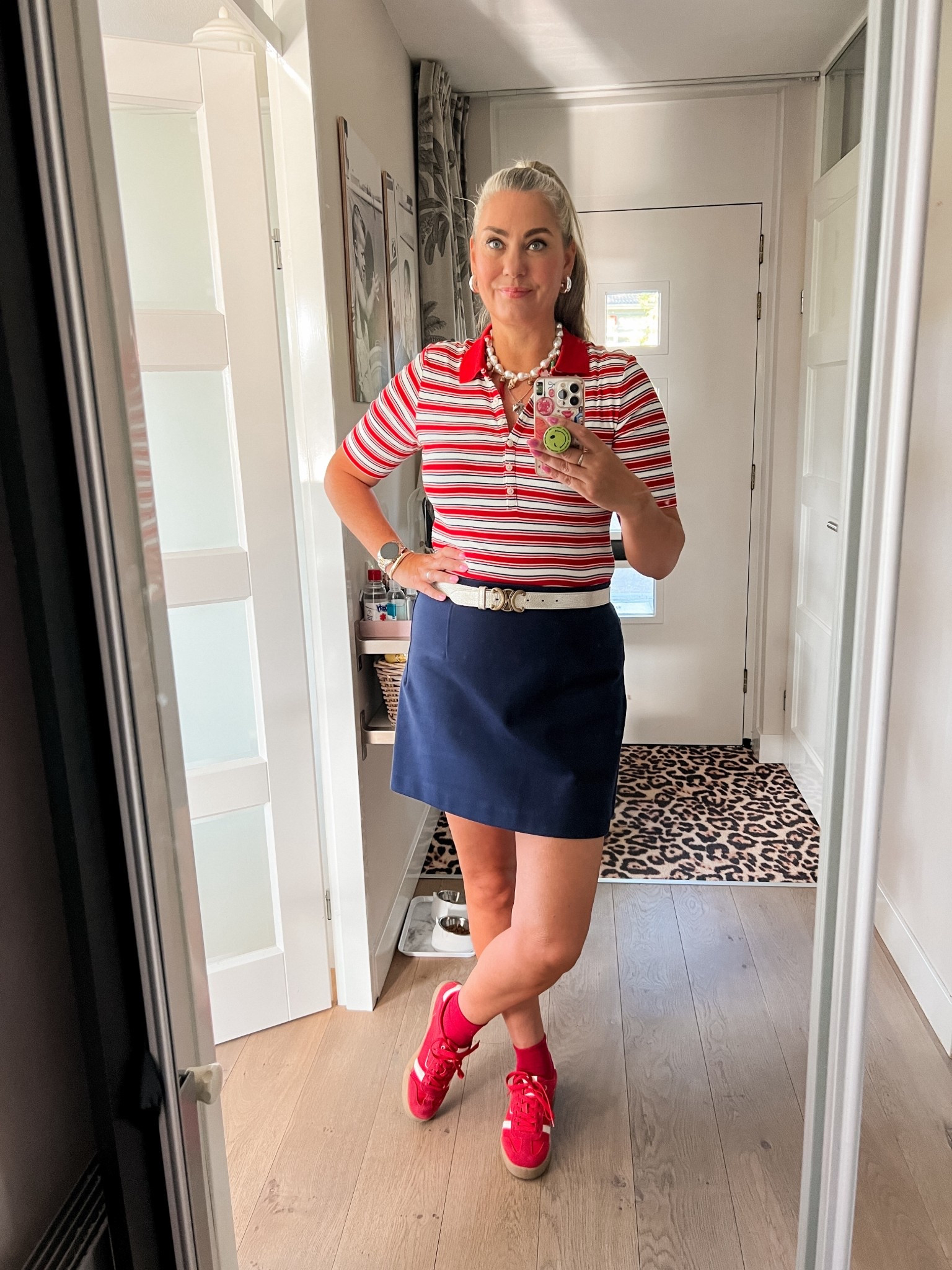Ootd - Wednesday. A red striped polo (L) paired with a navy blue a-line mini skirt (L), red socks and sneakers and a pearl charm necklace. 



#LTKworkwear #LTKnederlands #LTKeurope