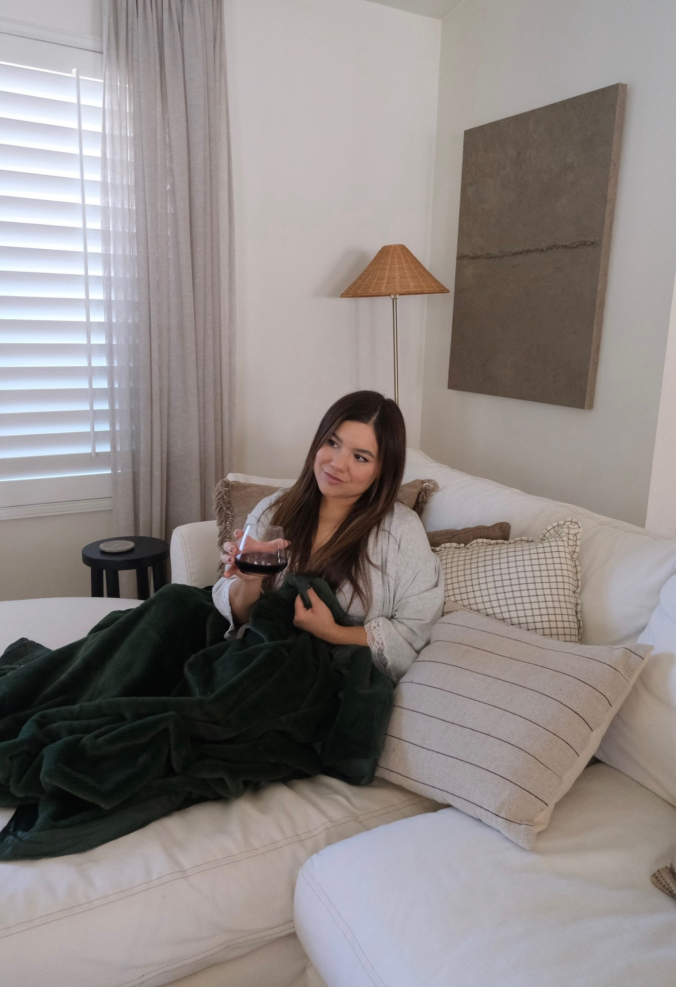 Quiet moments feel few and far between, but when they happen, I sink right in. The softest blanket you’ll ever own @littlegiraffeislove linked on my @shop.ltk 🕯️#ad #LittleGiraffe #liketkit 

#LTKmomlife #LTKHome