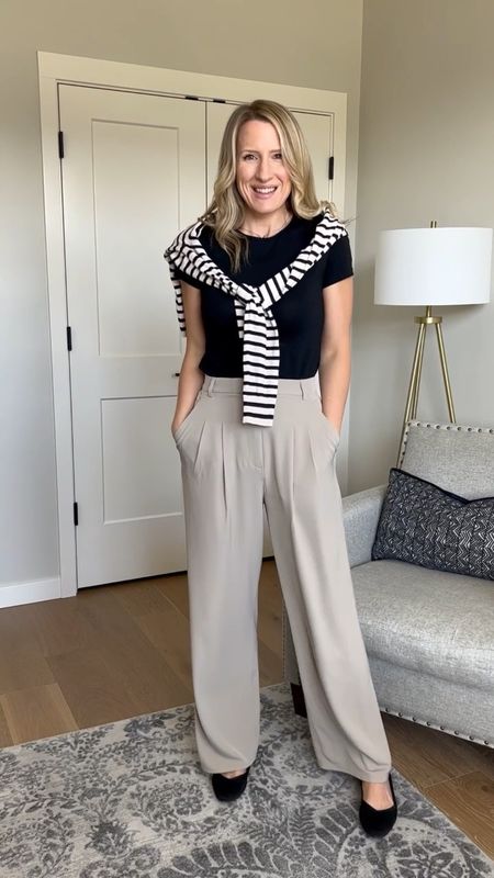 Today I’m pairing these high waisted women’s trousers (pleated pants) with a basic black t-shirt, black flats and a striped cardigan. #womensworkoutfit #stripedcardigan #workwear 

#LTKunder100 #LTKunder50 #LTKworkwear