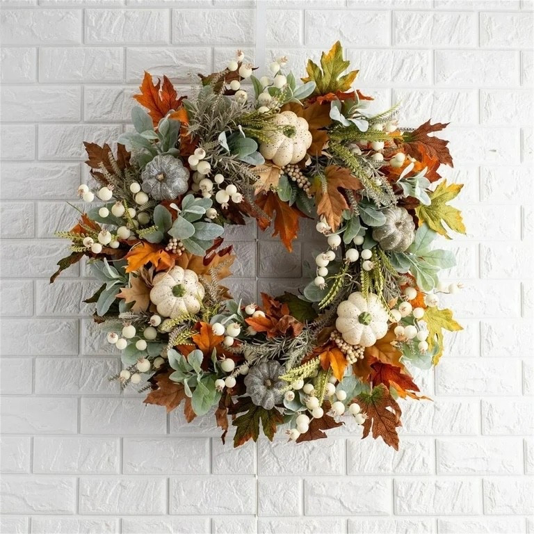Add cozy charm to your home this season with this beautiful fall wreath! Featuring mini pumpkins, vibrant autumn leaves, and frosted greenery, this wreath is the perfect statement piece for your front door, entryway, or living room. A must-have for fall lovers who want to bring the warmth of autumn indoors.

#LTKHome #LTKHalloween #LTKSeasonal