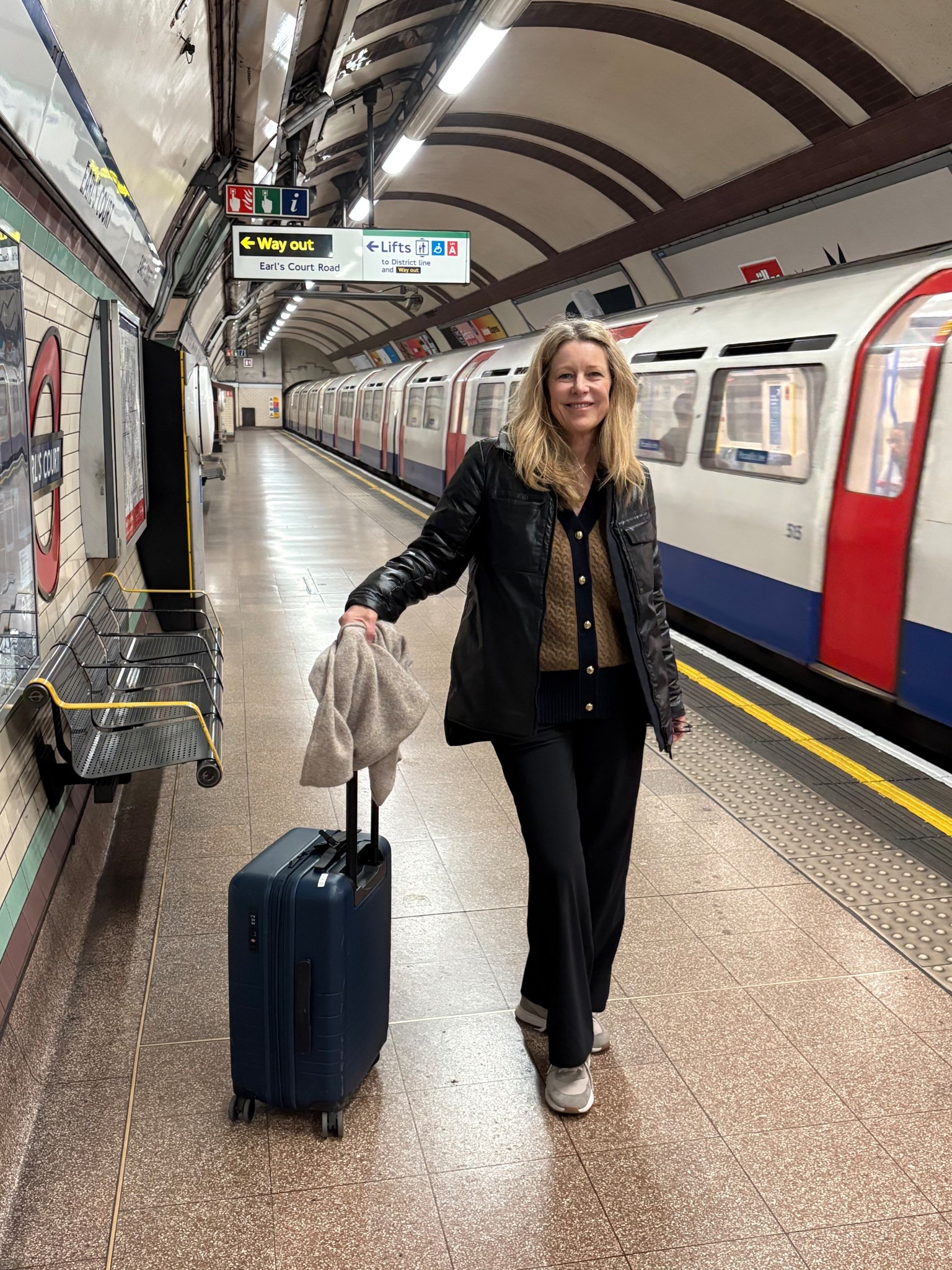 Travel outfits 
📍London

Farewell London! 🇬🇧
I always wear layers for long travel days. A t-shirt is the bottom layer, in case it’s warm on the plane, then a sweater or sweatshirt and in this case  my bulkiest coat because there wasn’t room to pack it. I also travel with a cashmere sweater or scarf (lightweight but warm) which is atop my suitcase handle here. It’s great for around my neck or as a makeshift blanket. 

My “travel pants” feel like yoga pants, stretchy with an elastic waistband, but look like trousers.

I travel with two small roller bags because I find they are easier to maneuver, lift etc.  than one large heavy suitcase.  My husband had my other. This one is expandable; it’s fantastic! 

TIP: The London tube goes right to Heathrow airport so that’s what we did. Many stations have escalators, some have elevators. Plan accordingly depending how much luggage you have. 


#LTKStyleTip #LTKOver40 #LTKTravel