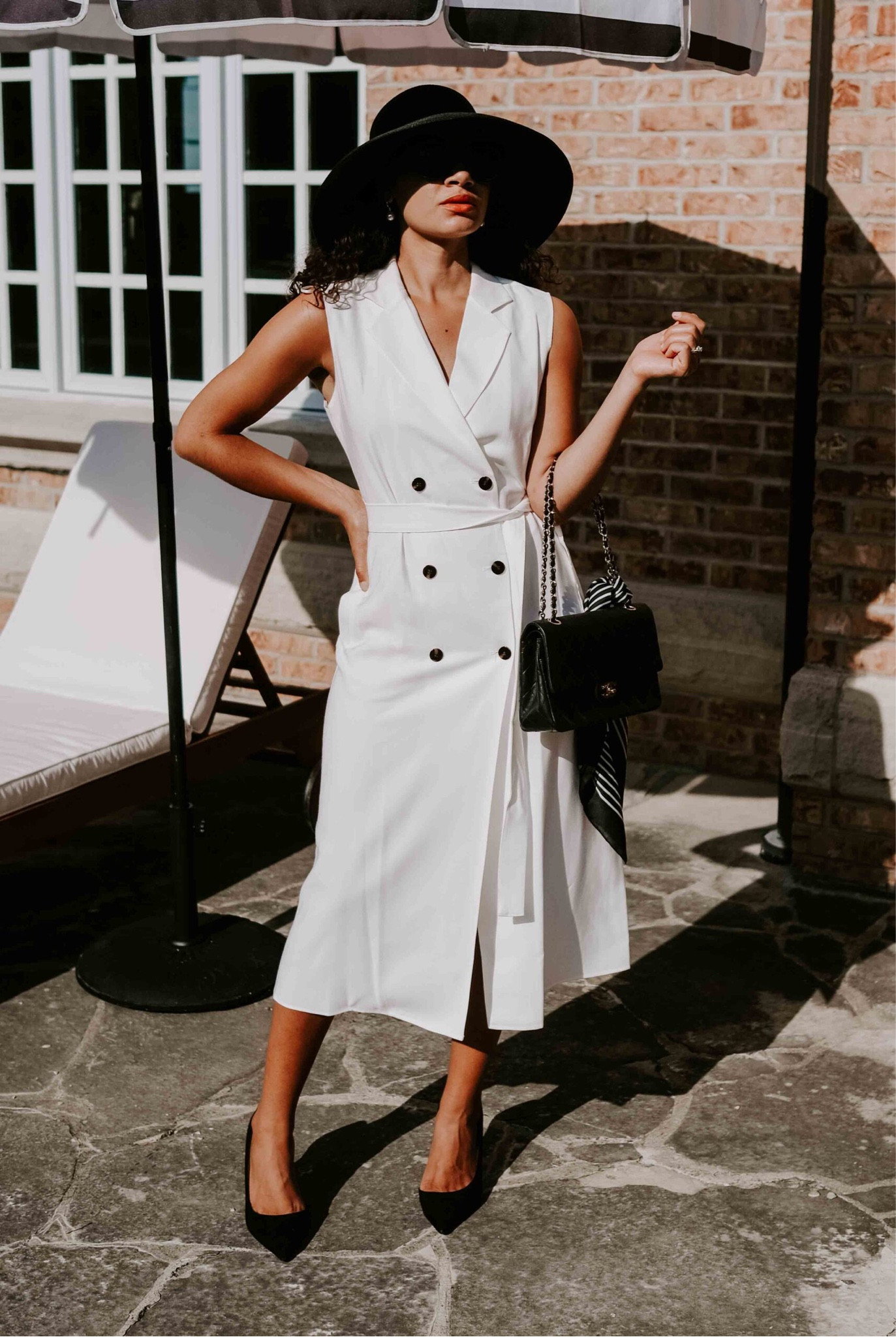Channel Meredith Blake (Parent Trap anyone?) and the old money aesthetic with a belted wrap dress from Banana Republic, a quilted Chanel lookalike, a wide brimmed black felt hat and classic black pumps from Mango. 

#LTKFind #LTKfit