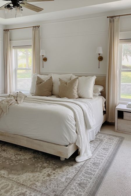 minimalist bedroom details ✨ neutral bedding | bedroom curtains | gold curtain rod | wall sconces 

#LTKhome #LTKfindsunder100 #LTKstyletip