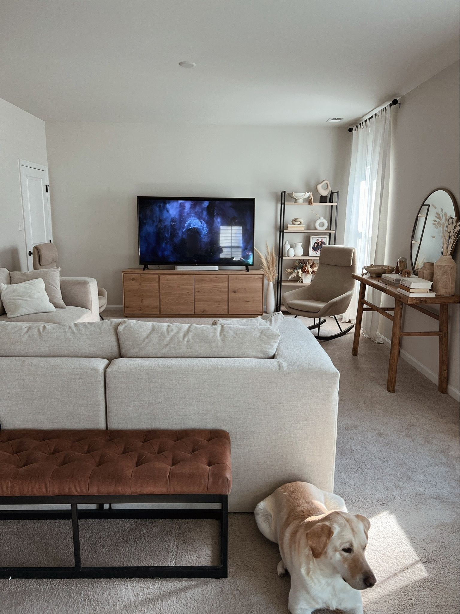 Recently got the Norre media console from West Elm and loving it! Our living room is slowly coming together: target shelf styled with H&M and west elm ceramic vases, amazon table with gold round mirror, L shaped couch, and HomeGoods leather bench. Highly recommend the white sonos sound bar because of its quality and aesthetic!

#LTKhome #LTKstyletip #LTKfamily