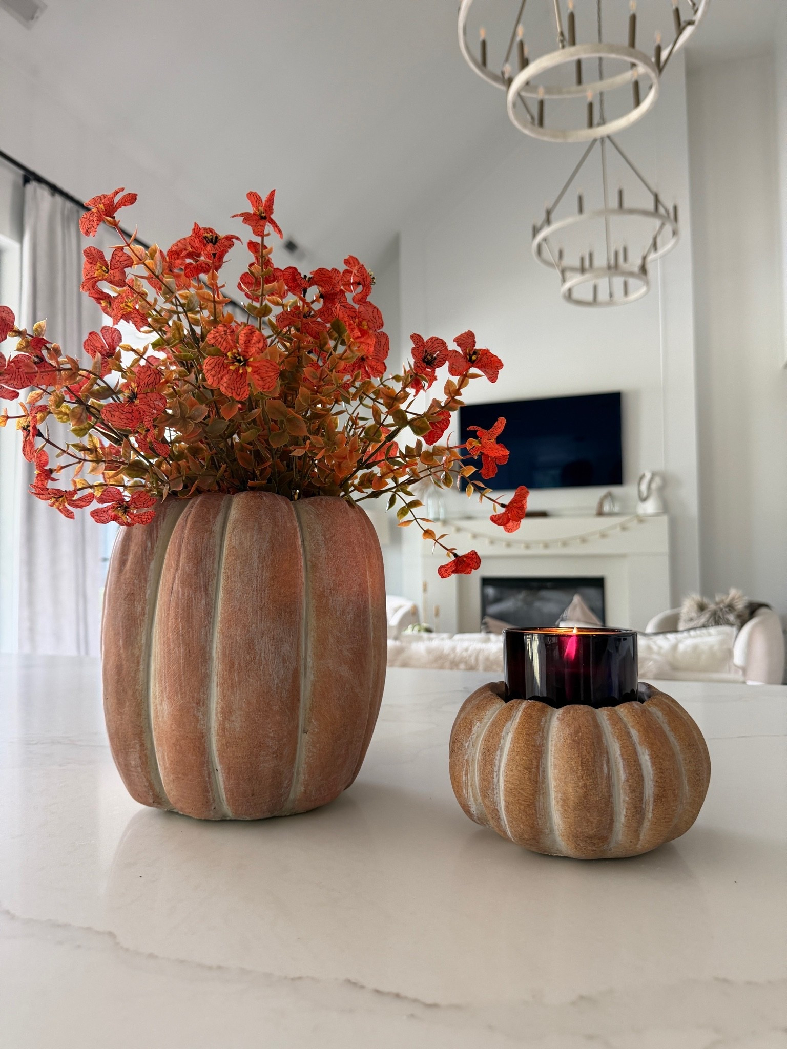 Faux mums and pumpkin vase

#LTKOver40 #LTKHome