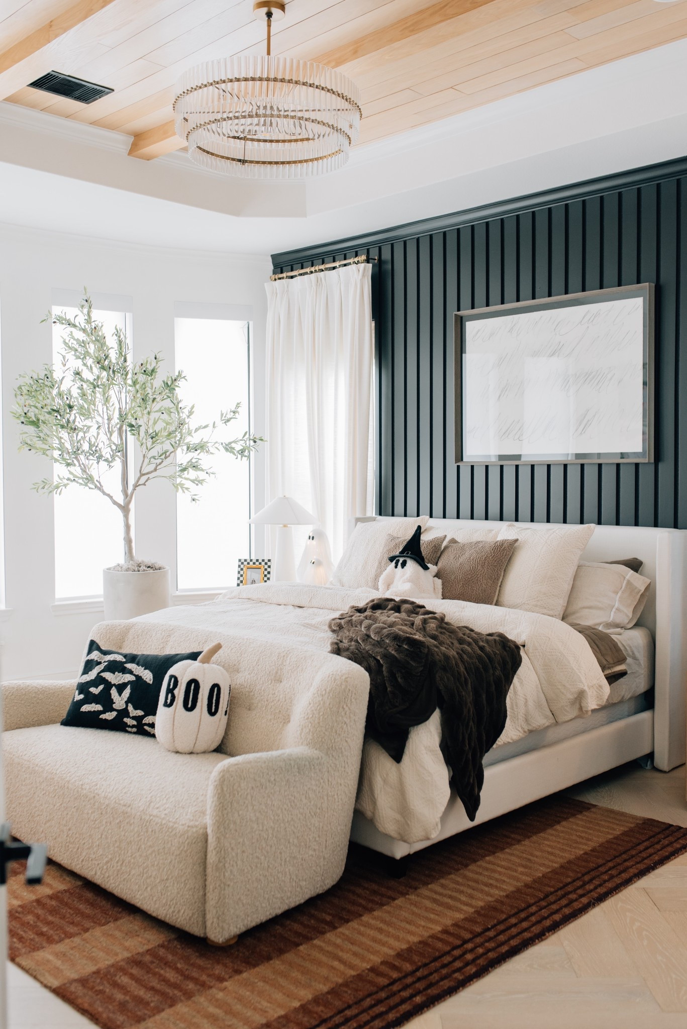 Our bedroom for the fall season! We updated our bedding with warm tones and pillows! I also added a sofa that has been great for nursing and lounging throughout the day 