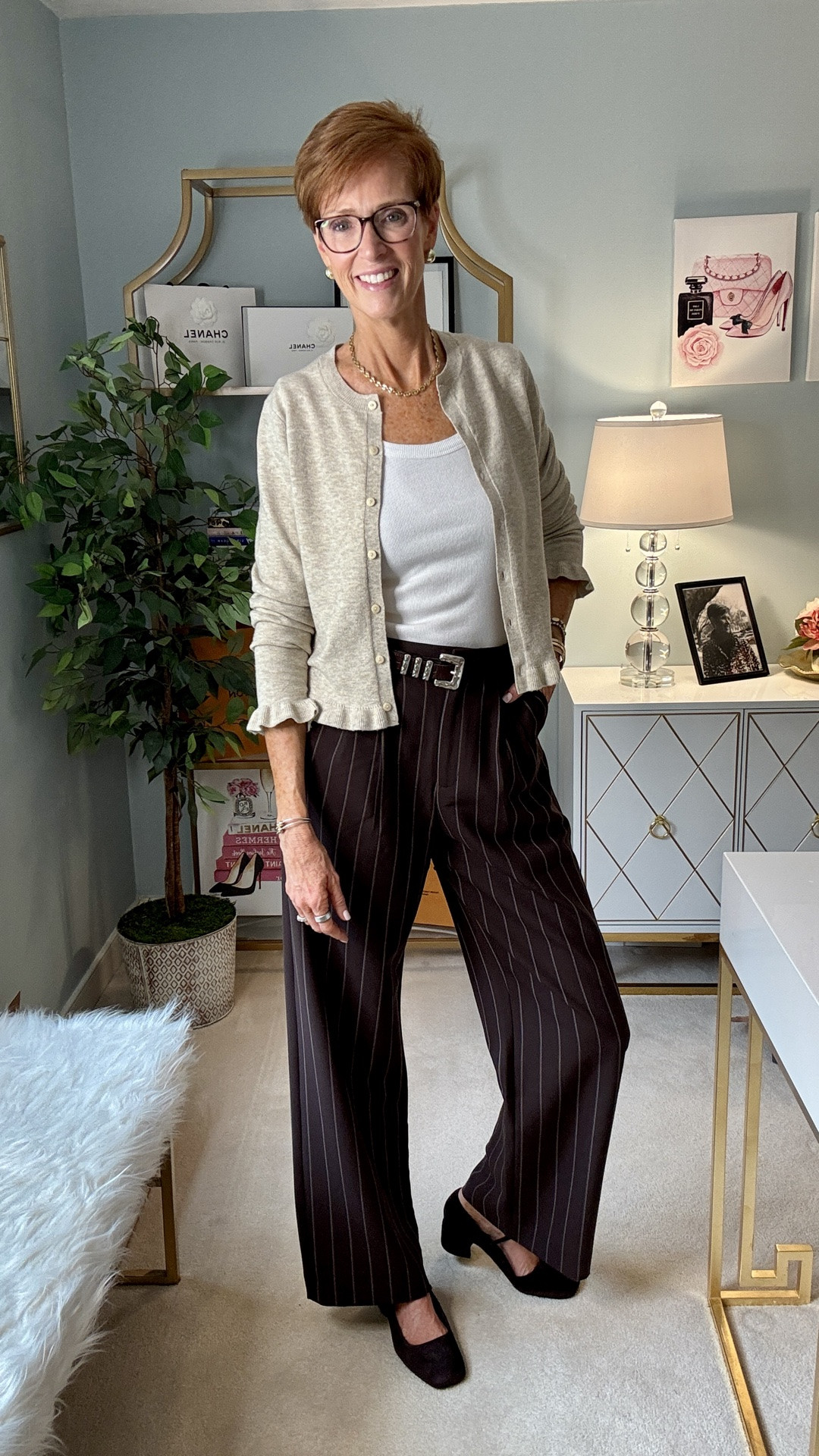 Pinterest gave me the idea. My closet made it wearable.

Comment PINTEREST  and I’ll send everything over

Pinterest Inspired Outfit #31 might be one of the easiest fall outfit formulas I’ve recreated yet: brown pinstripe trousers, a cream ribbed tank, a light beige cardigan and brown suede woven flats.

And this is exactly why I think a great pair of fall trousers earns its place in your closet. They can look polished without feeling overly dressed, and keeping everything else soft and neutral makes them incredibly easy to wear for everyday life.

This week is all about fall trousers, and I’m showing you how to make them work beyond the office — because good trousers should earn more than one kind of outfit.

SAVE this one for the next morning you’re staring at your closet wondering what to wear, and SEND it to a friend who loves an easy neutral fall outfit.

Would you wear this one? And tell me: are you wearing trousers more often this fall?

#FallTrouserOutfits #PinterestInspiredOutfit #Over50Style #TallWomenStyle

#LTKootd #LTKOver40 #LTKTall