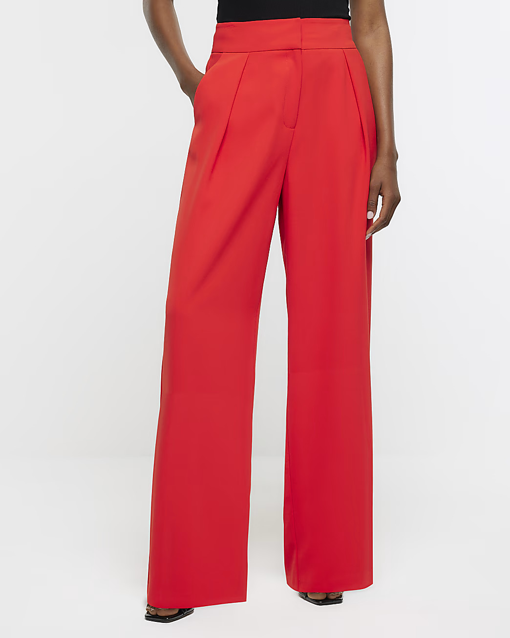 Red pleated wide leg trousers | River Island (UK & IE)