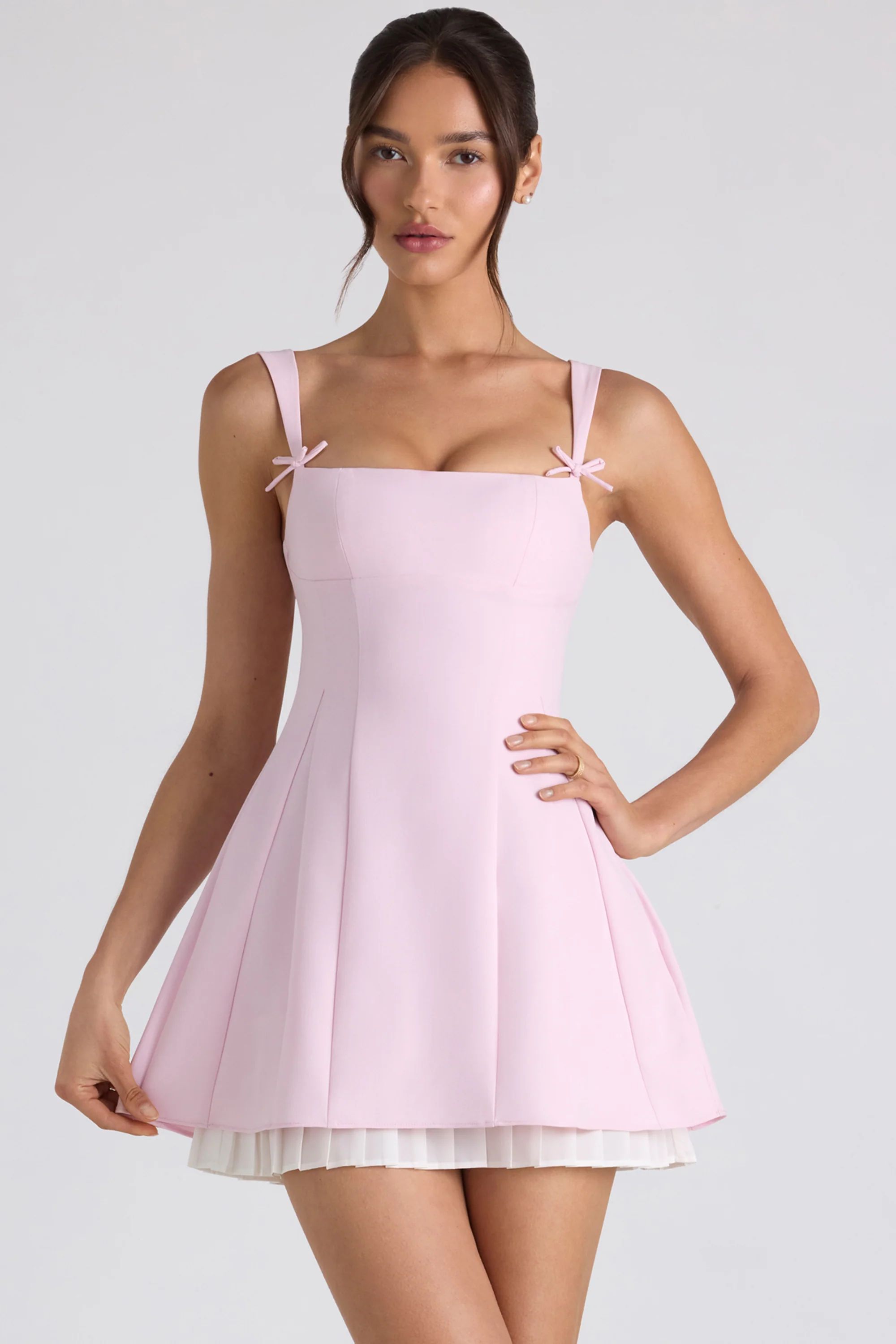 Bow-Embellished Pleated A-Line Mini Dress in Soft Pink | Oh Polly