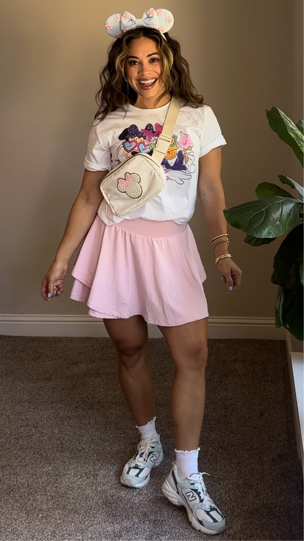 I love this easy attainable look everything is mostly from Amazon prime except the shoes. I will link everything for you! Tennis skirt// New Balance// feminine outfits #disneyootd #disneylandlook #minniemouse #daisyduck 