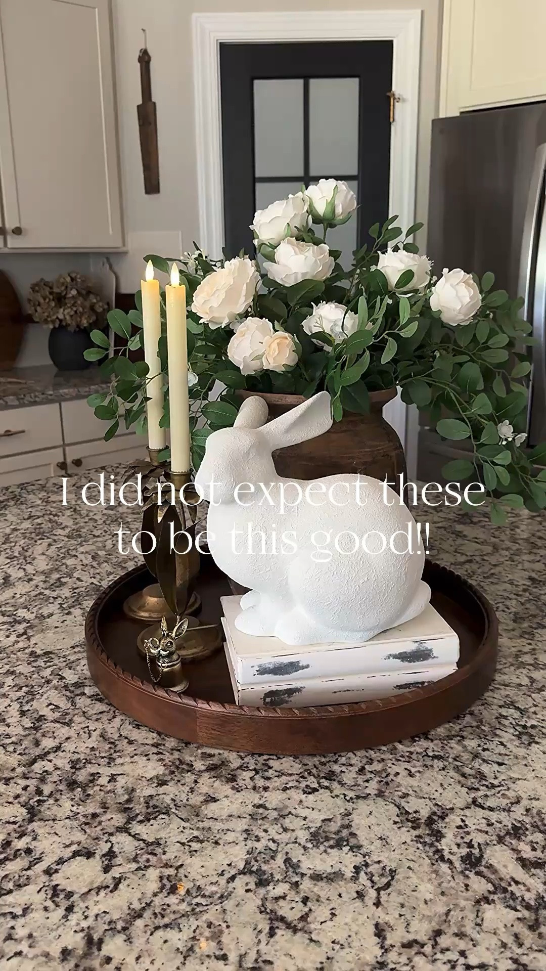 Spring Tray Styling!!
These antique brass candle holders are absolutely beautiful. They resemble daffodils and are perfect for spring. 
My tray is no longer available. I have linked some similar options. My bunny was a DIY.

Vintage wood vase, cabbage roses, greenery with tiny white flowers, rabbit candle snuffer, antique brass daffodil candle holders, flameless candles, distressed white books, tray, bunny

#LTKSeasonal #LTKHome #LTKstorytime