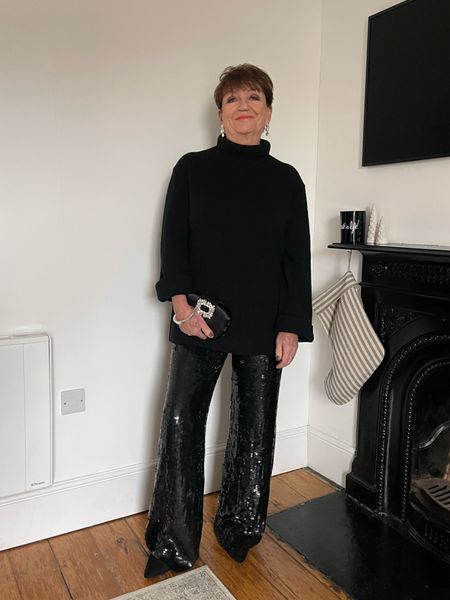 My mum styling sequins for a possible NYE outfit 
Sequin trousers
Longline black jumper
Heeled ankle boots 
Crystal earrings
Crystal bag

All SilkFred. 




#LTKHoliday #LTKparties #LTKSeasonal