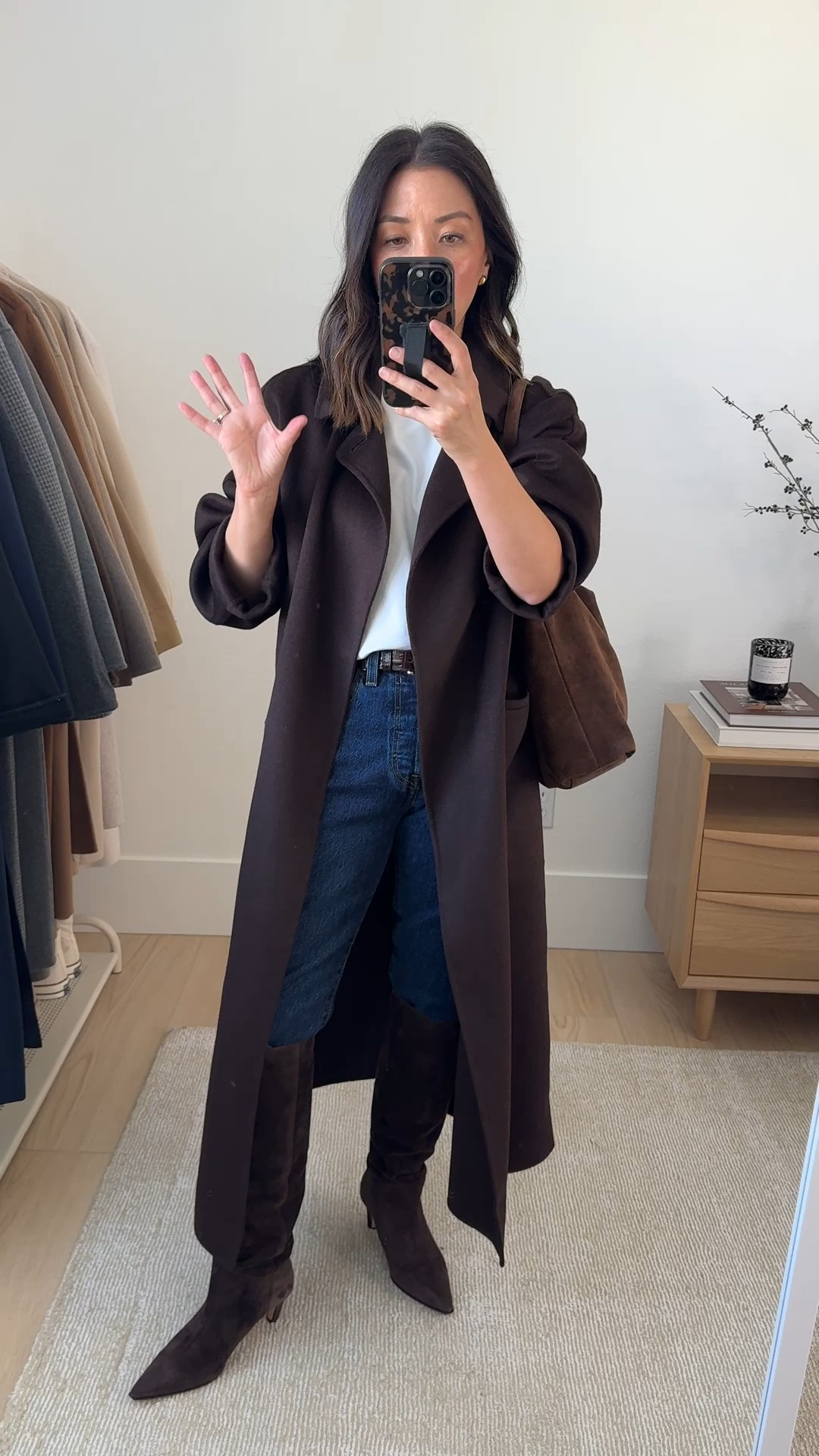 How to style knee-high boots for fall 2025. Knee-high boot outfit ideas. These are the J.Crew Stevie Tall Boots. The shafts have gotten taller over the years, but these are truly the only heeled tall boots you need. I have them in black and brown and they're so comfortable, great shaft circumference. These hit my knee, but I don't mind. They're so elongating. 

Banana Republic coat petite xs (old)
Aritzia tee medium
J.Crew belt
Levi's 501 Crop 25
J.Crew Stevie Boots 5.5 
Liffner Pillow Hobo bag
Celine sunglasses

#LTKPetite #LTKStyleTip #LTKSeasonal