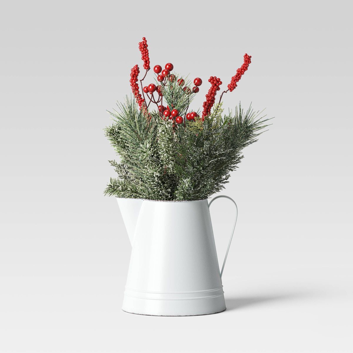 18.5" Metal Pitcher with Frosted Faux Greenery and Red Berries Christmas Artificial Plant Arrange... | Target