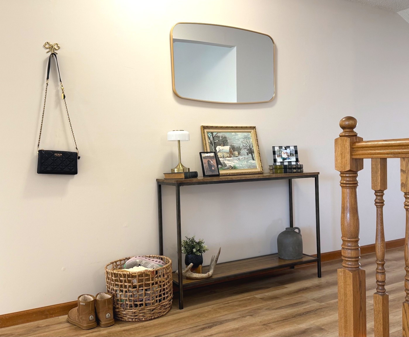 Creating a warm, functional entryway with neutral tones and layered textures 🤍
This slim console table is perfect for small spaces, styled with framed art, a brass mirror, and cozy storage baskets. I love mixing practical pieces like shoe storage with decor that still feels collected and personal.

Perfect inspiration for entryways, foyers, or hallway styling.

#LTKHome #LTKSeasonal #LTKKids