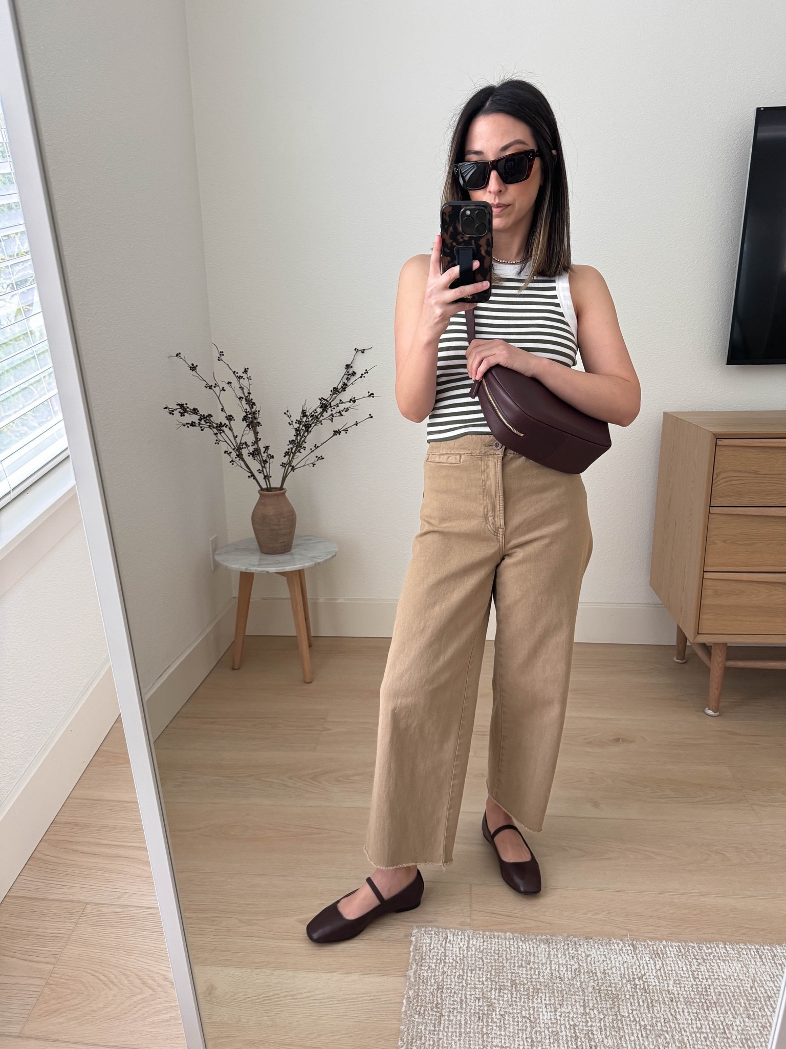 Madewell Emmett pants and drill khaki. Obsessed with these !!! So comfy and the color is stunning! I sized up for more comfort. Material
Is so soft. Went with the regular bc the petite rise is too short. Cut hems. 

Madewell tank xs
Madewell Emmett pants 25. Cut hems. 
Madewell flats 5
Madewell sling bag 

Spring outfits, spring style, purse, petite style 

#LTKsalealert #LTKfindsunder50 #LTKitbag