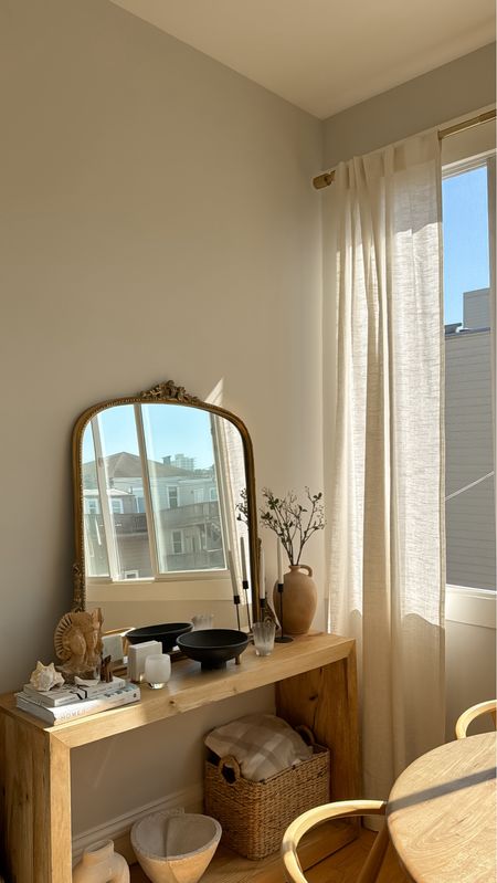 Dining room details:

3 ft Anthro mirror
Console table
West elm curtains and rods 