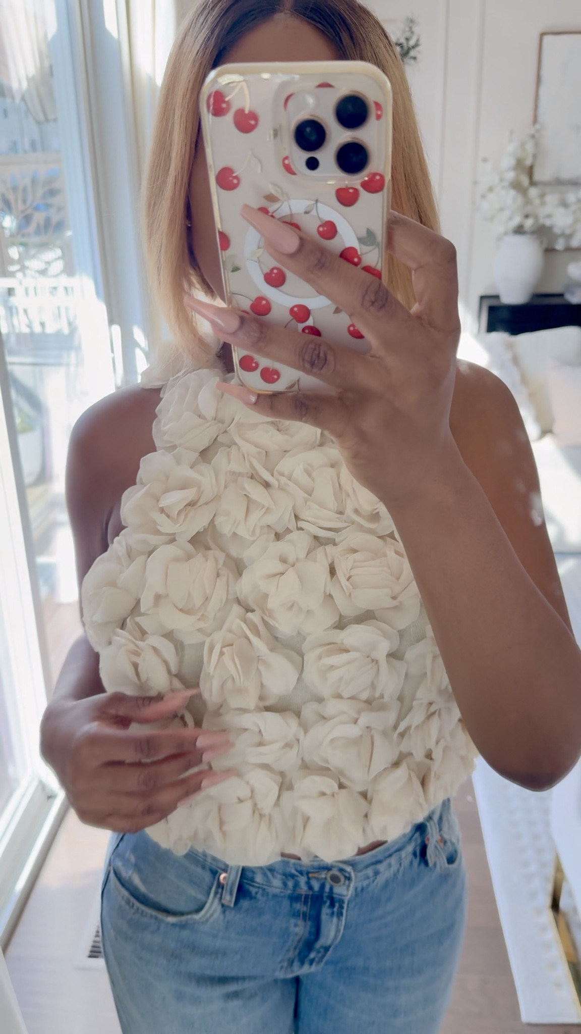 This floral top could be perfect for a Mother’s Day brunch . Love the appliqué flowers. 

#LTKMidsize #LTKSeasonal