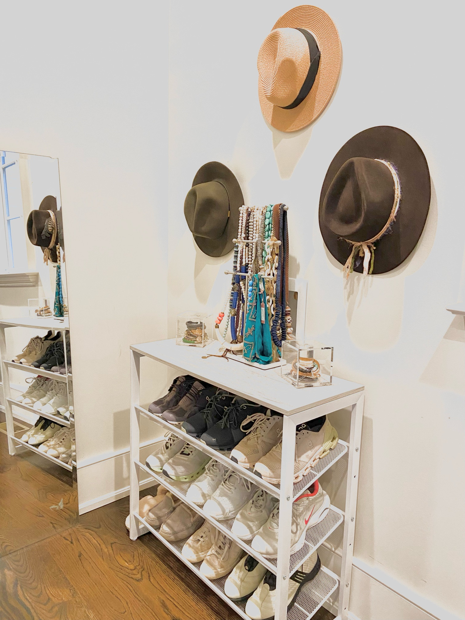 This shoe rack was a game changer for this closet nook! It provided extra storage for overflow shoes AND had a distressed wooden top that made a great home for our client’s every day jewelry. Add a couple command hooks for hats & voila! ✨

#LTKhome #LTKstyletip #LTKshoecrush