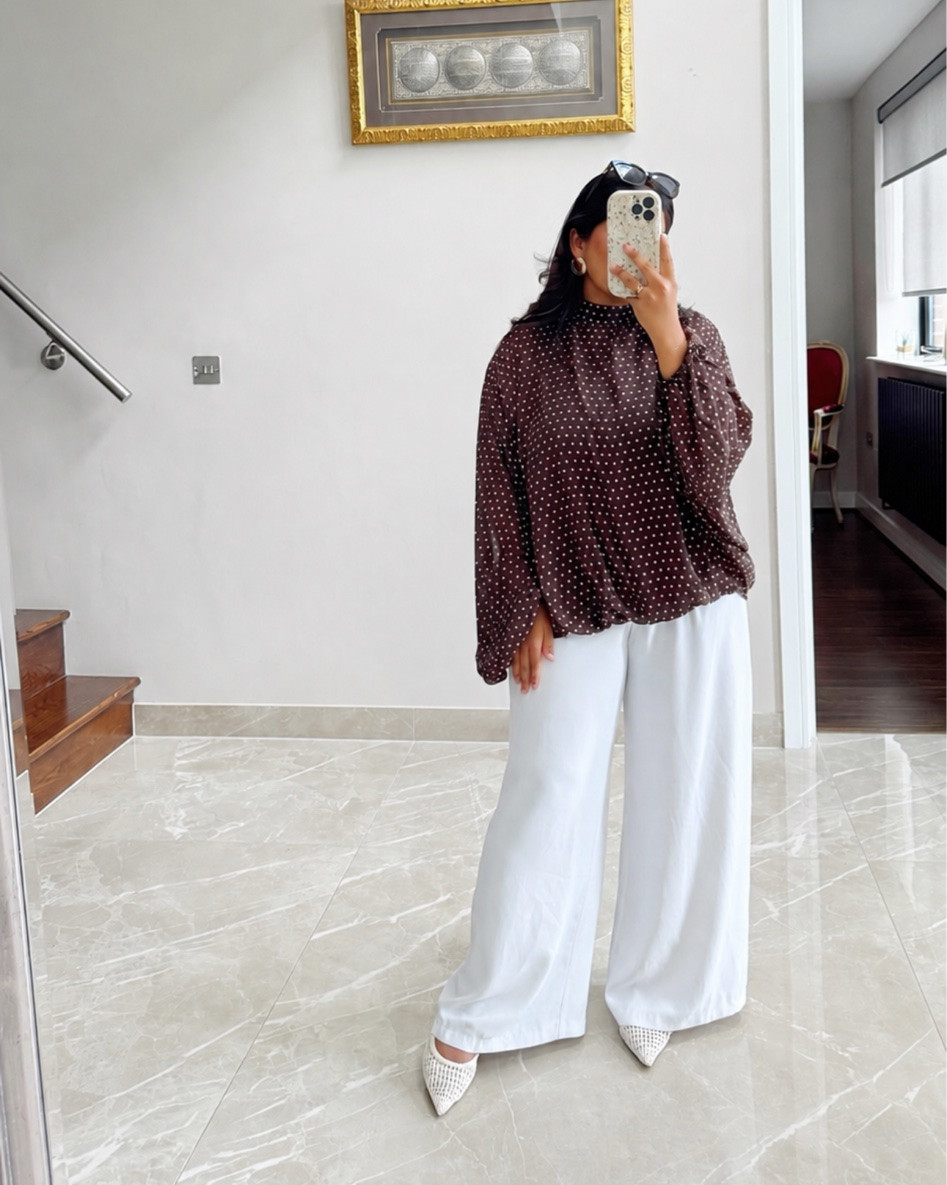 polka dot blouse white trousers