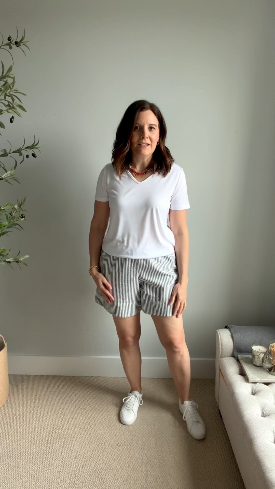 This banded hem tee fits true to size. I’m in a Small. These shorts are made of a linen blend fabric and have a relaxed fit with a 6” inseam, so they’re not too short and not too long.
The leg is looser, which always makes my thighs feel smaller in comparison, which I love. They have a 12” rise and I wear a medium, true to the sizing chart.
The elastic drawstring waist is comfortable. They don’t shrink when washed and dried on a delicate cycle. 
I got these on sale for 50% off. Definitely wait for a sale.

#LTKOver40 #LTKSaleAlert #LTKMidsize
