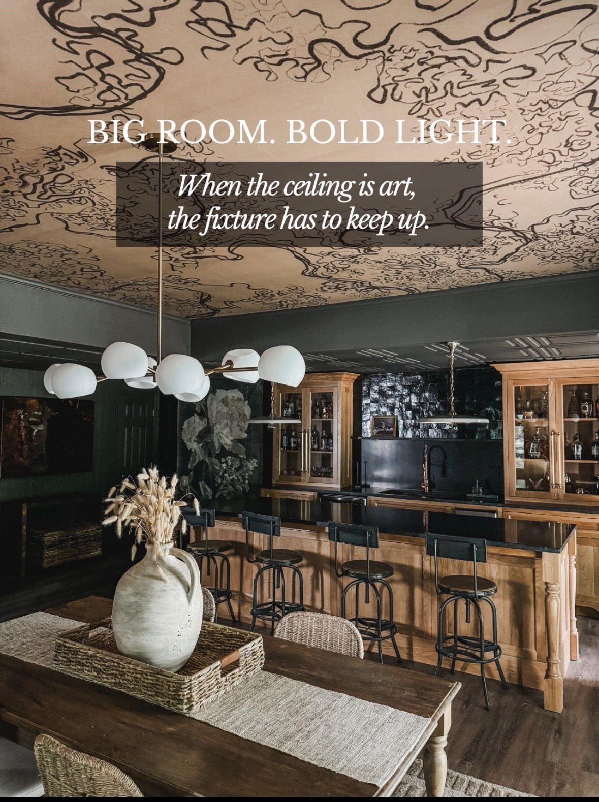 When the ceiling is art, the lighting has to rise to the occasion ✨
This statement globe chandelier anchors the space while balancing a bold patterned ceiling, dark moody walls, and warm wood cabinetry. The mix of brass lighting, matte white globes, wood bar stools, and a large kitchen island creates contrast without competing. Layered with woven textures, a rustic dining table, and organic decor, this is a perfect example of how scale, proportion, and lighting design elevate a dramatic kitchen and dining space. Everything is linked on LTK 🤍

#eanesinteriors #statementlighting #globechandelier #kitchenlighting #diningroomlighting #patternedceiling #moodyinteriors #darkkitchen #woodcabinetry #kitchenisland #barstools #woventextures #organicdecor #classicinteriors #timelessdesign #LTKhome #LTKinteriors

#LTKSeasonal #LTKHome #LTKOver40