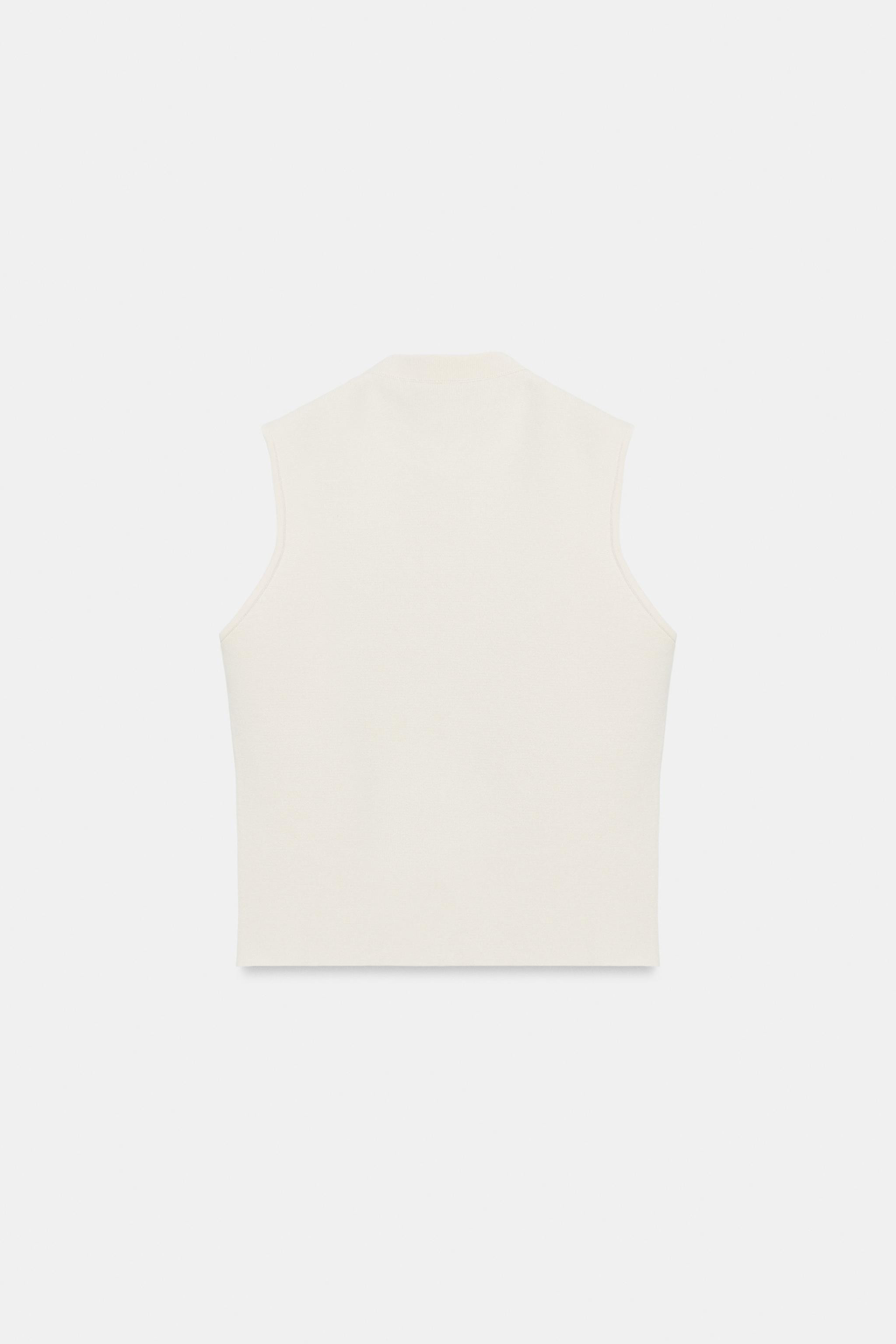 Model height: 181 cmRound neck, sleeveless waistcoat top. Front button fastening. | Zara UK