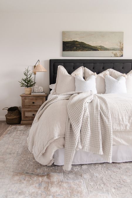 Cozy winter bedroom decor, light neutral area rug, linen bedding, waffle throw blanket, charcoal headboard, farmhouse nightstandd

#LTKstyletip #LTKSeasonal #LTKhome
