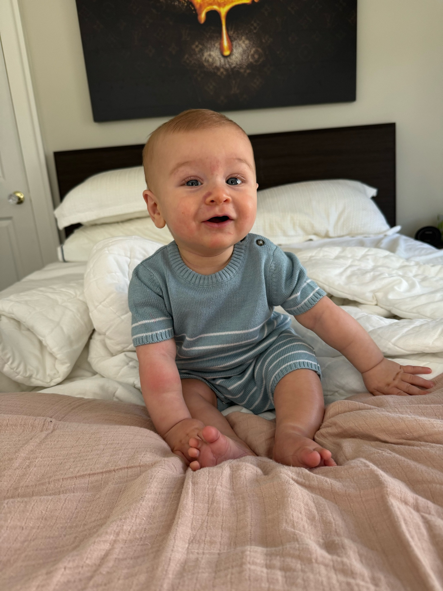 Hudson is wearing 9mo so definitely recommend going up so they can wear it longer! 

#LTKBaby