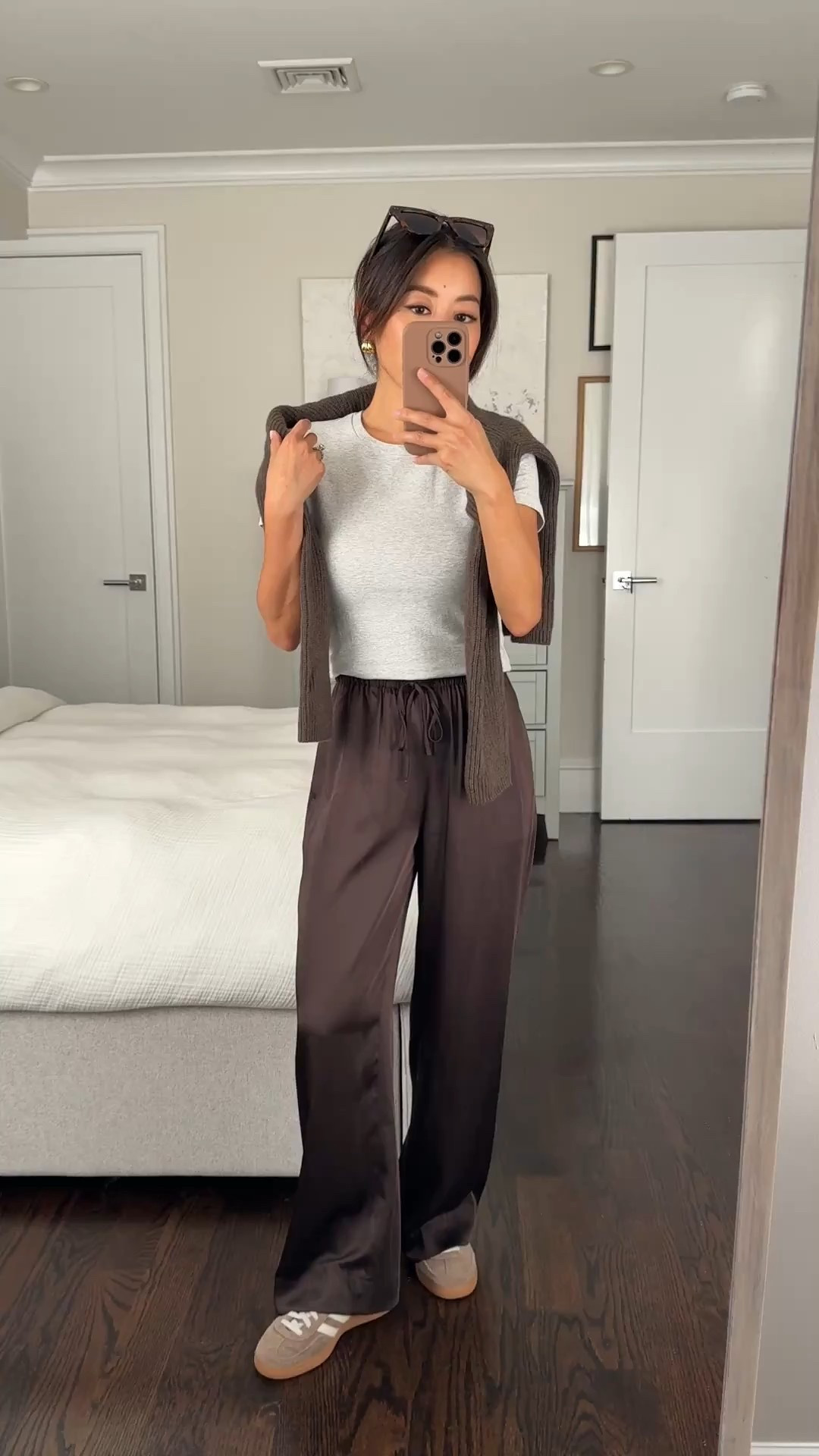 Satin pants restocked! Code AFJEAN for 20% off $125+ this weekend , ending 2/16

• Abercrombie satin pull on pants xxs short, length that actually works for petites without needing heels. 

• Abercrombie baby tee xs, I sized up bc it’s fitted 

• quinces cashmere rib sweater Xs 

• adidas shoes size 5, runs big 

• BP sunglasses

Travel style, elevated casual, silky pants, mom on the go outfits 

#LTKPetite #LTKSeasonal #LTKmomlife