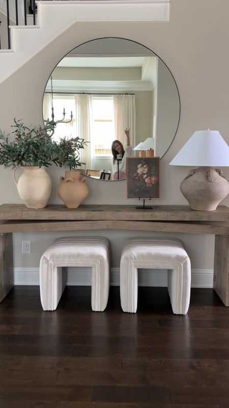 The art of console table styling. I shared a couple of my tips for styling a console table. Featuring my award winning console table. I like creating balance with a lamp and a similar size vase at the opposite end of the table. I balance out the visual weight from the top by adding ottoman’s or baskets beneath the console (if you have an open one). I then layer in the smaller decor accessories and you’re done! Make sure to check out my blog for more details on this! Beigewhitegray.nett

#LTKhome #LTKstyletip #LTKVideo